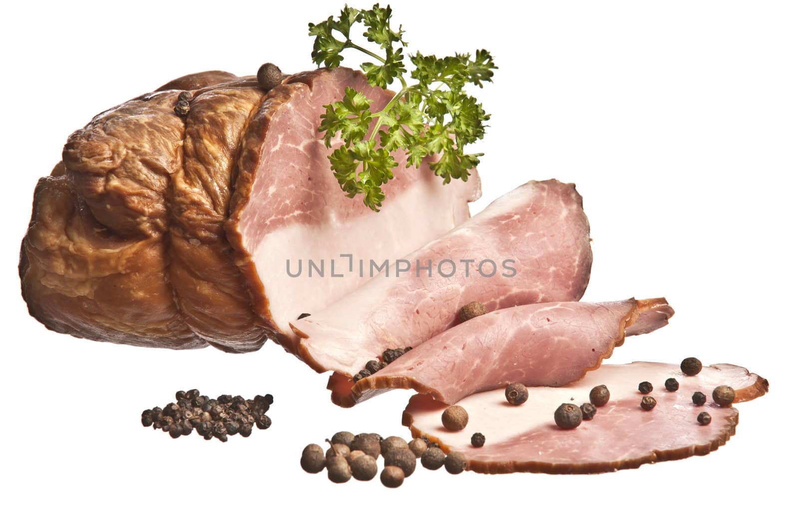 The boiled pork decorated by pepper and a parsley on a white bac by DGolbay