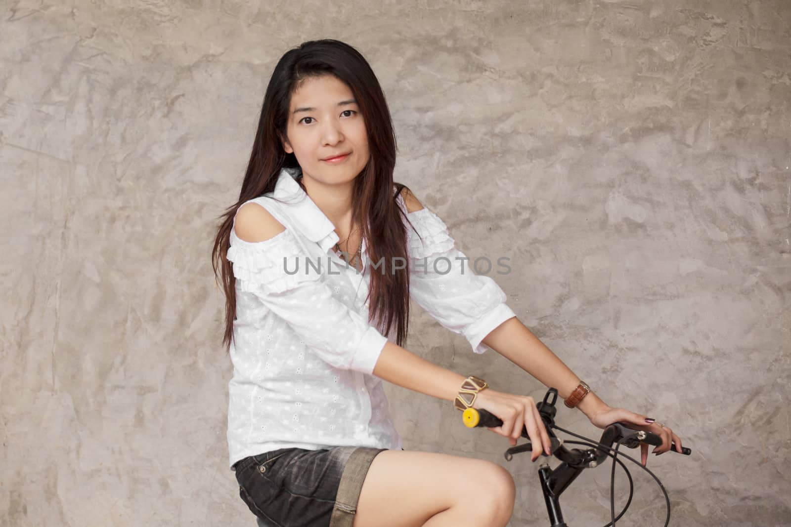 young woman with bicycle by FrameAngel