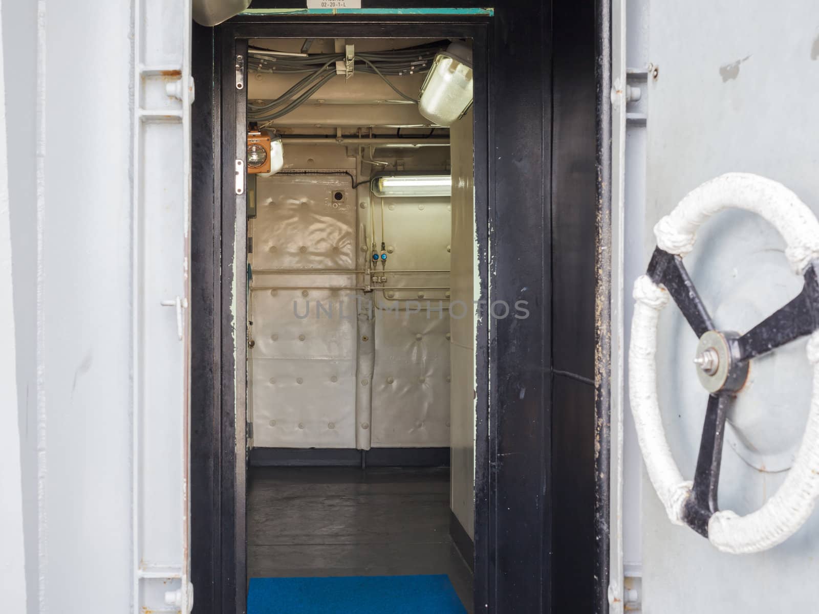 Handle of white ship door open inside