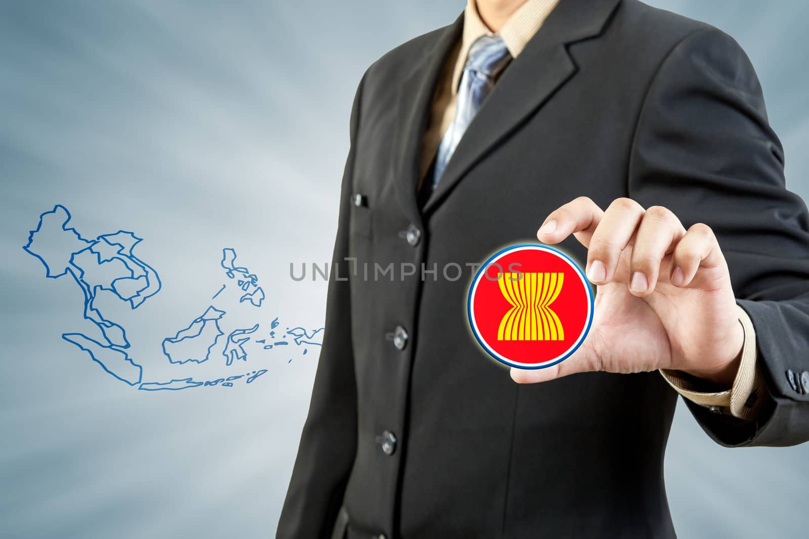 ASEAN Economic Community in businessman hand