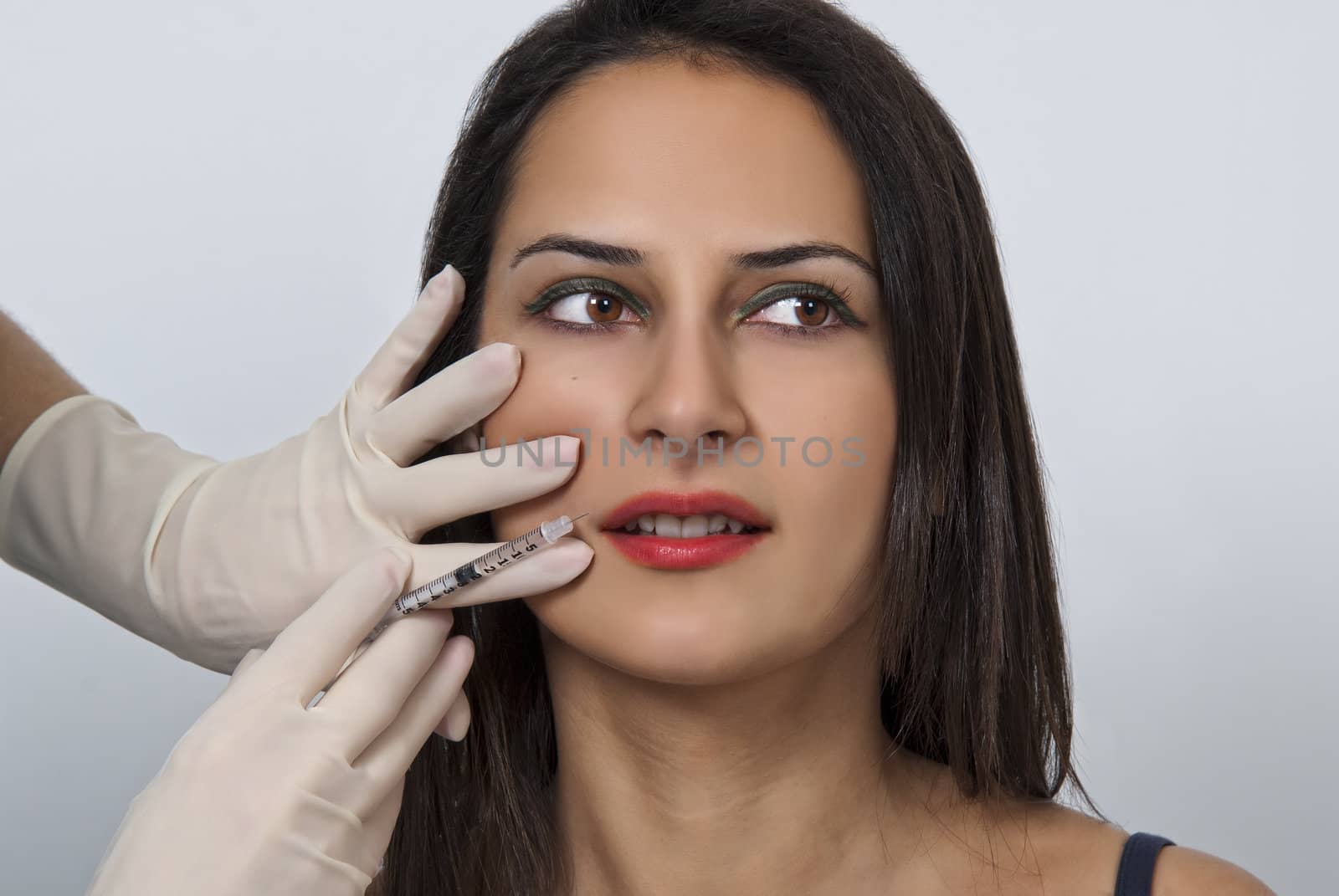 Cosmetic botox injection in the female face