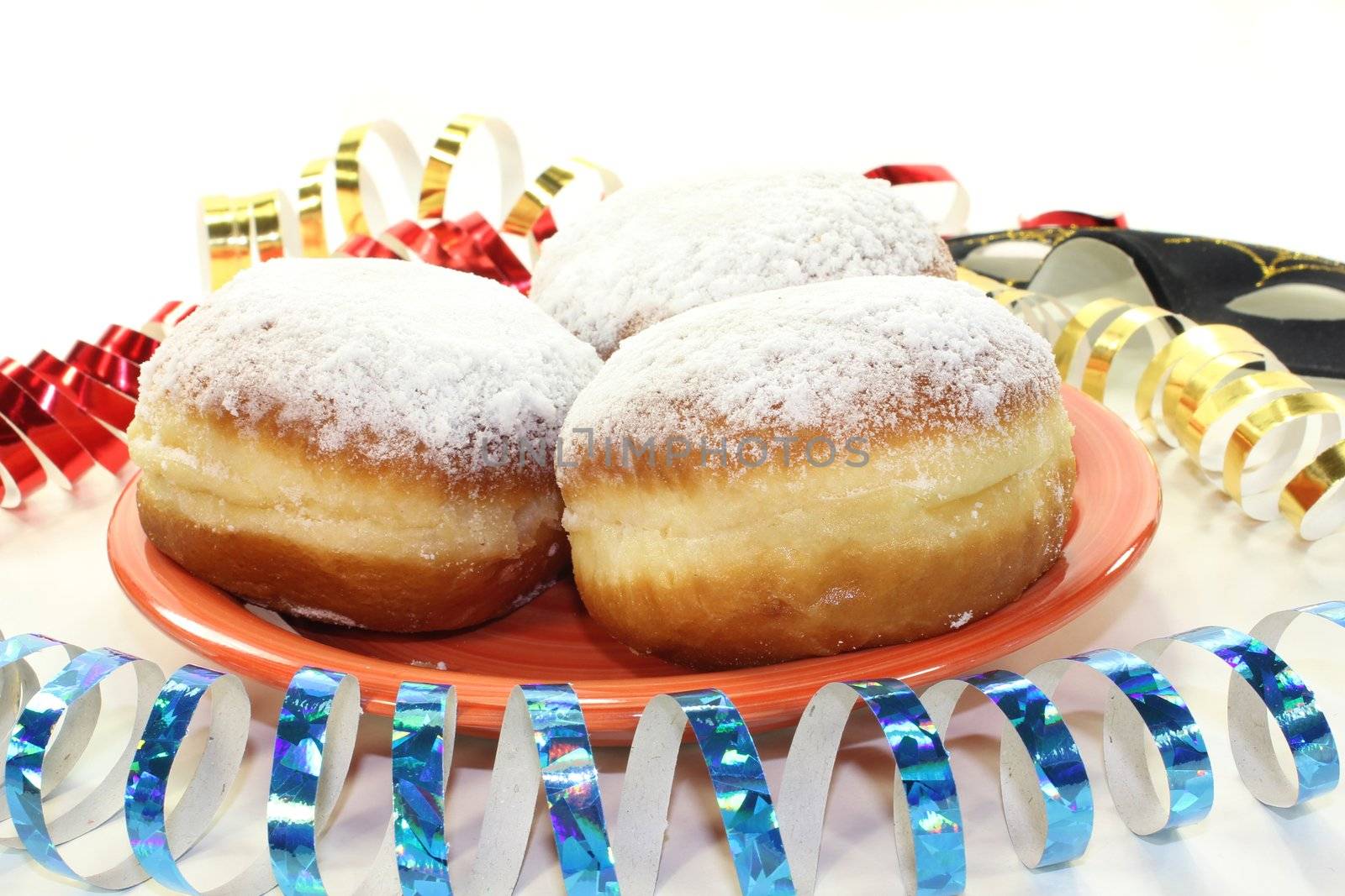 a plate of donuts on a white background