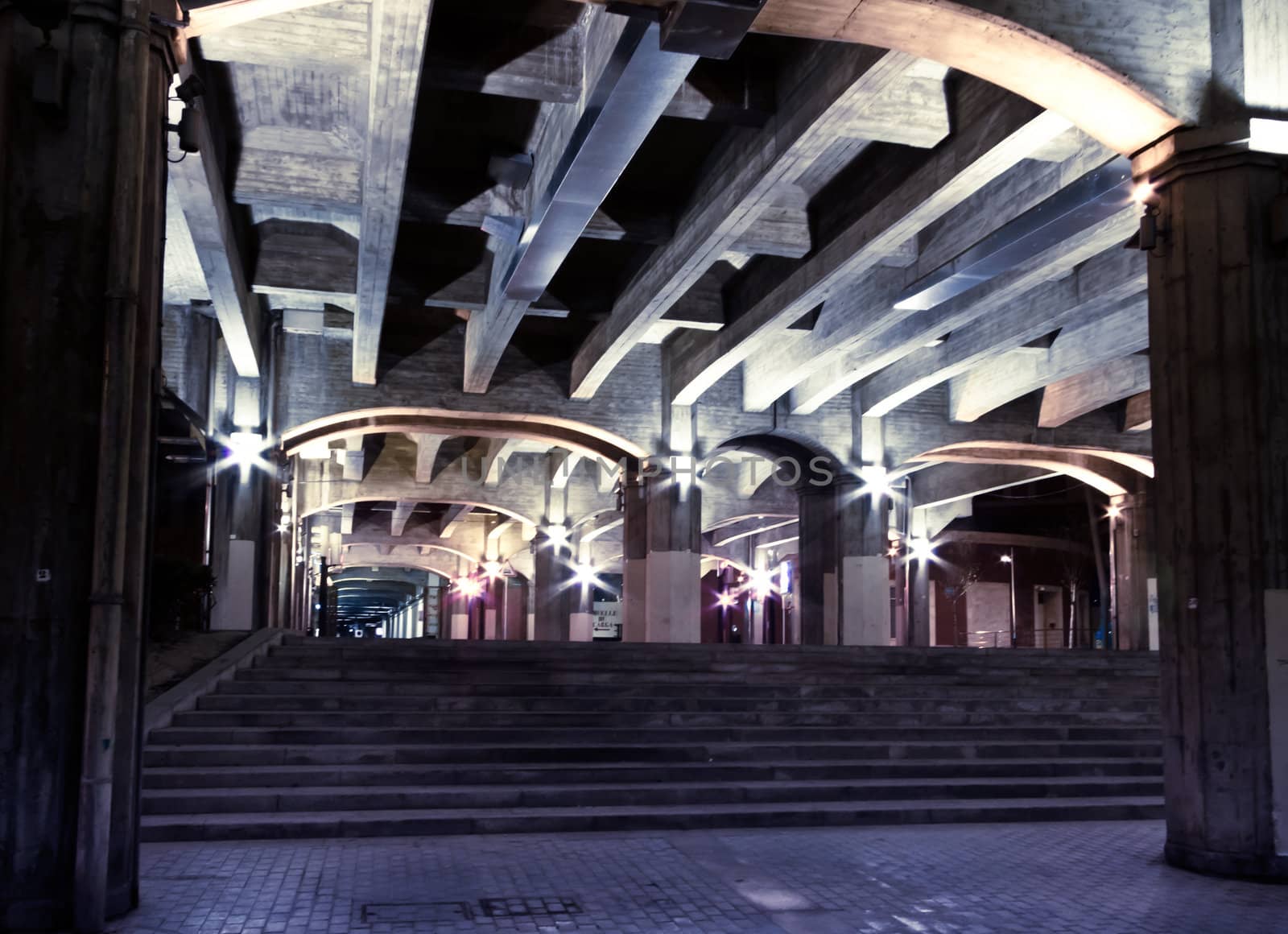 Nightview concrete beams under solitaire city passage
