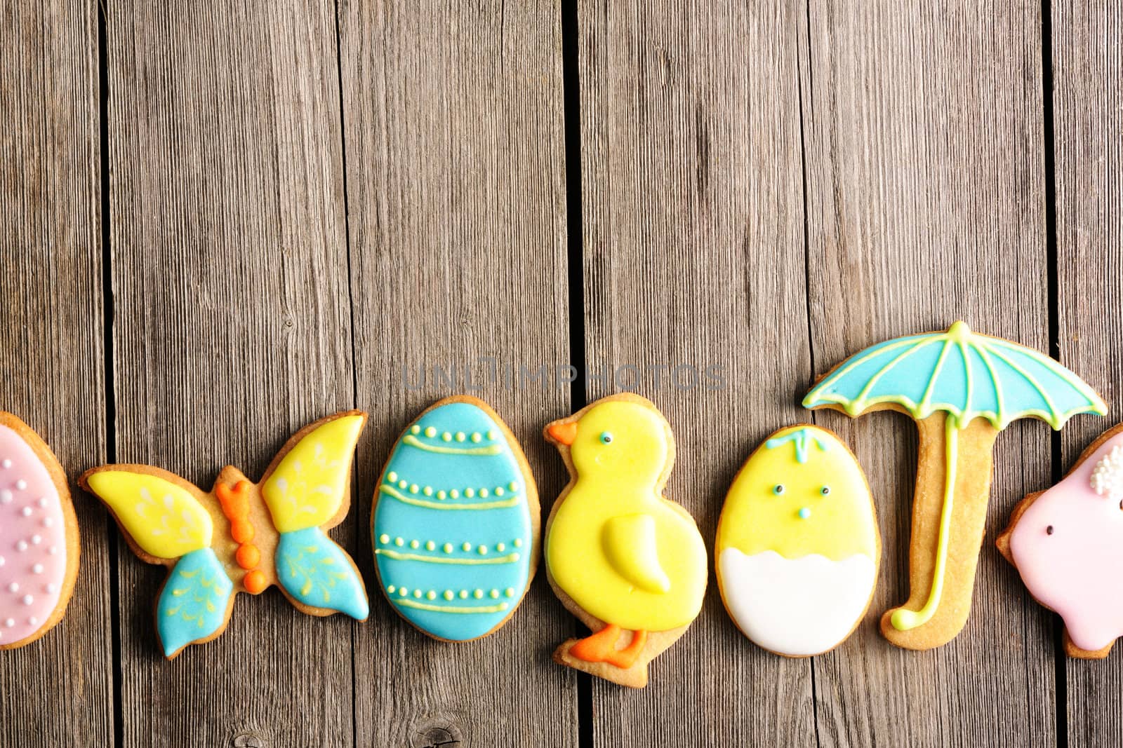 Easter homemade gingerbread cookie over wooden table