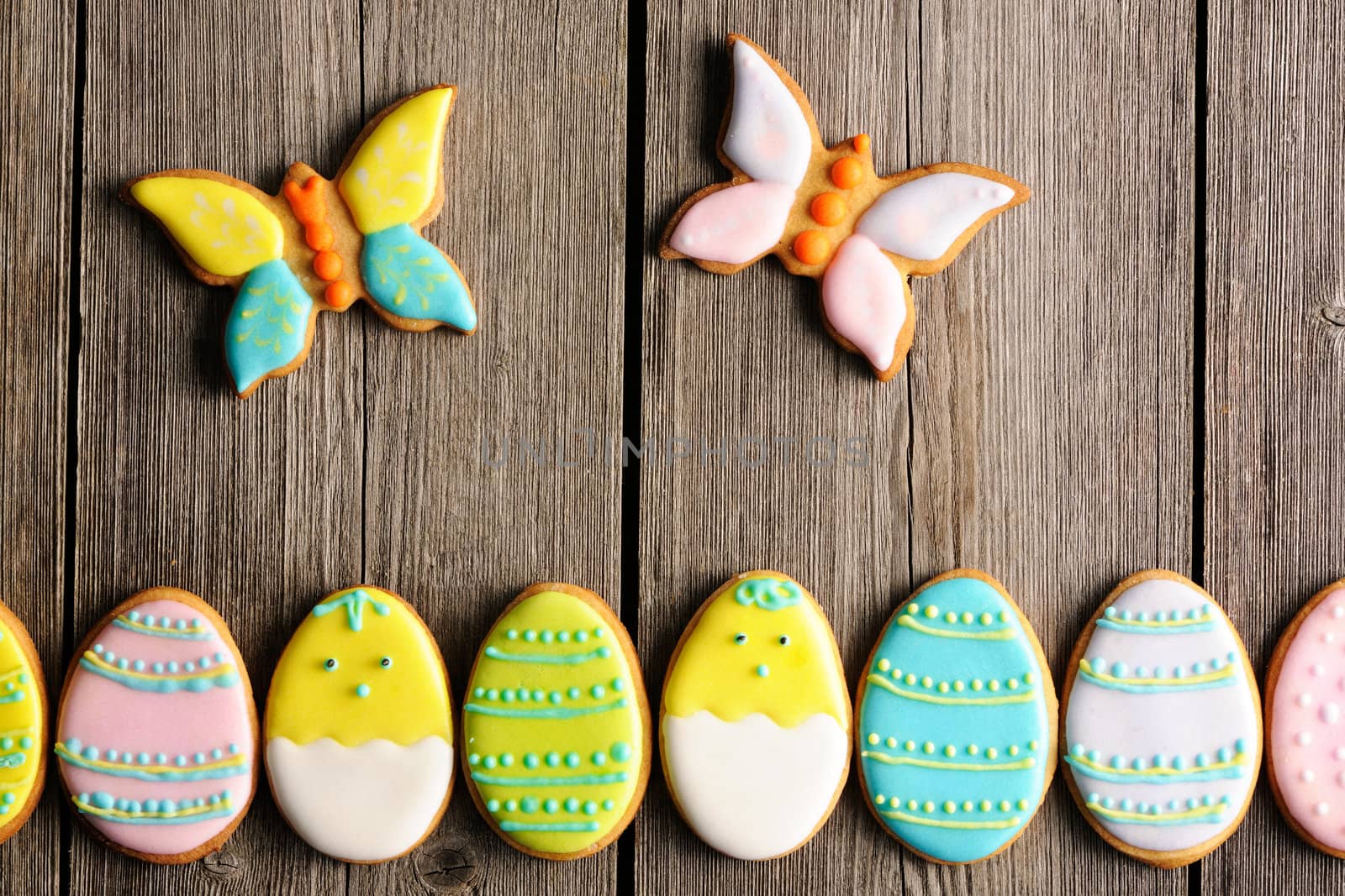 Easter homemade gingerbread cookie over wooden table