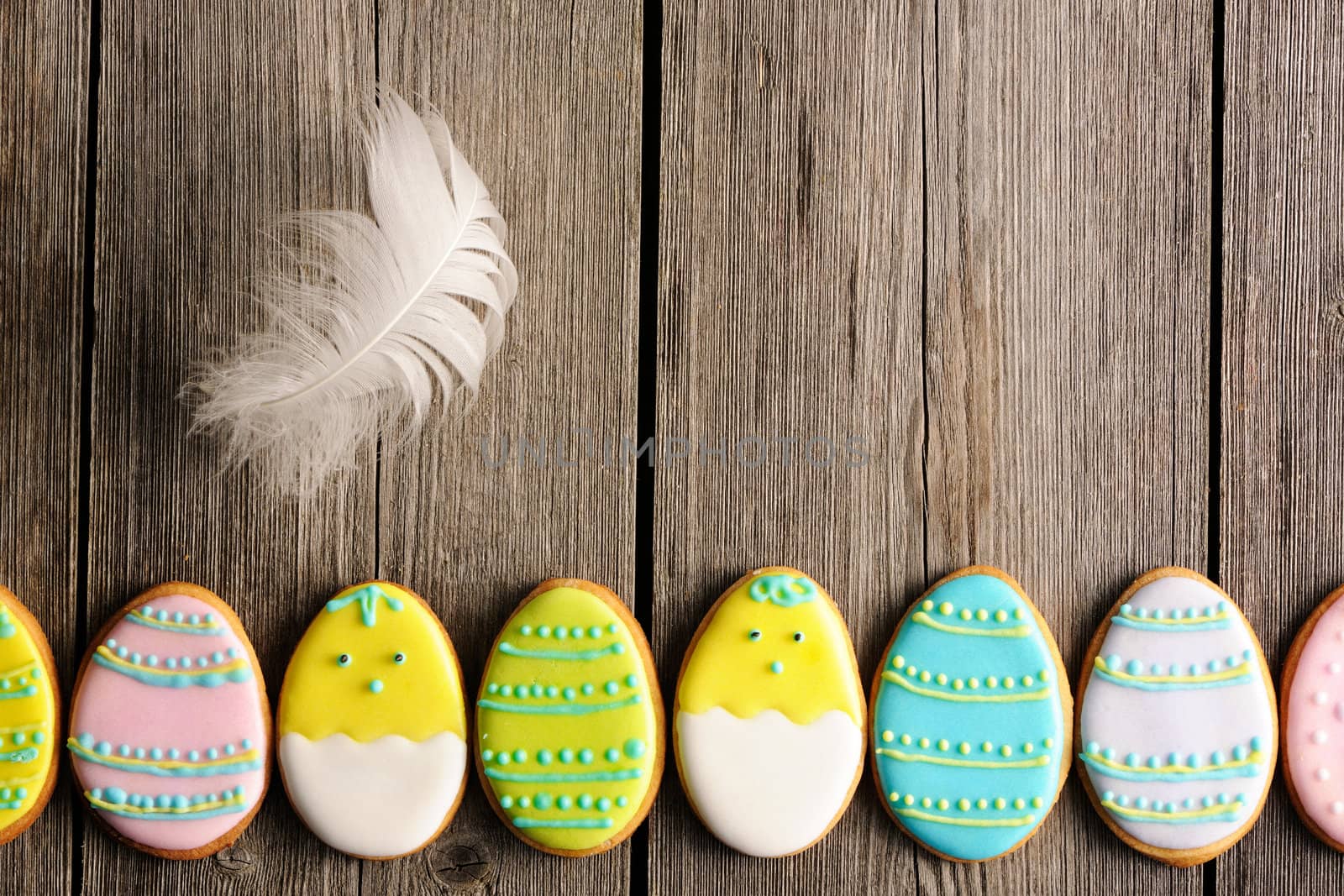 Easter homemade gingerbread cookie over wooden table