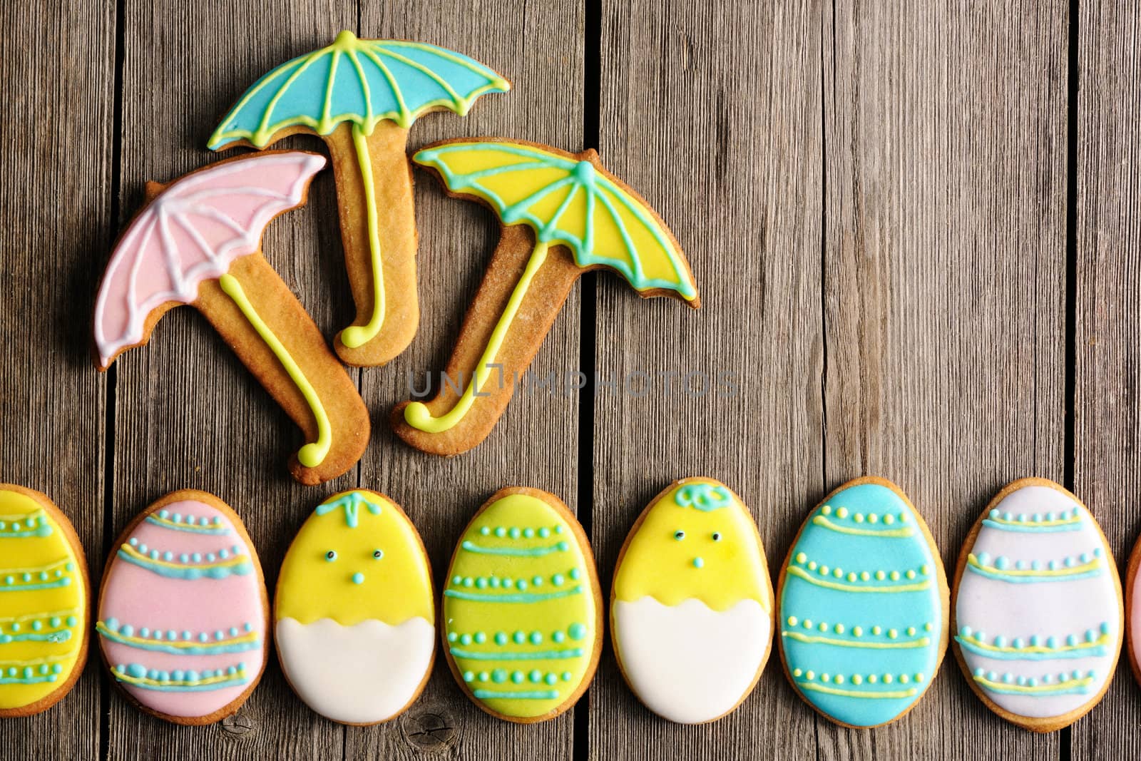 Easter homemade gingerbread cookie over wooden table