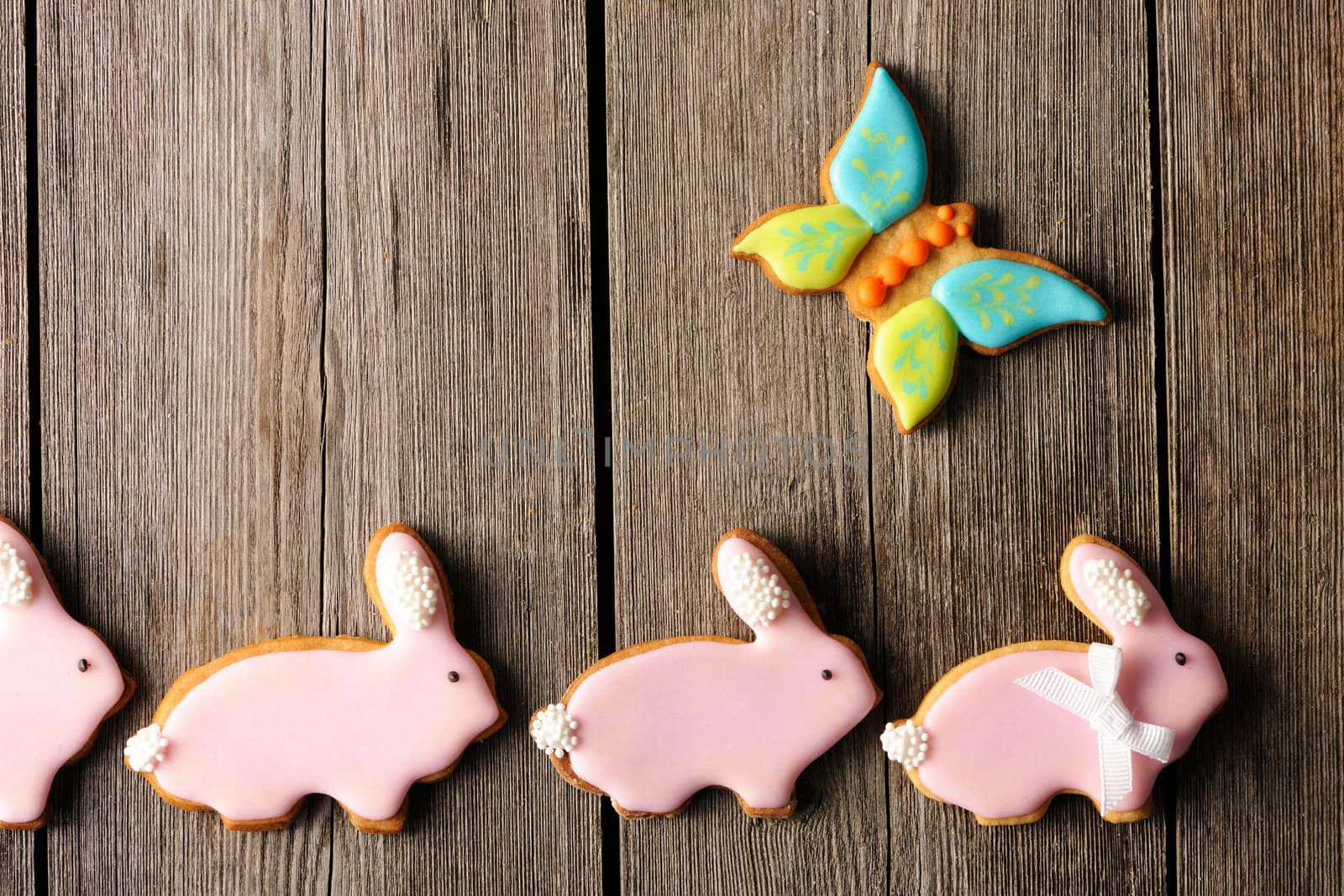 Easter homemade gingerbread cookie over wooden table