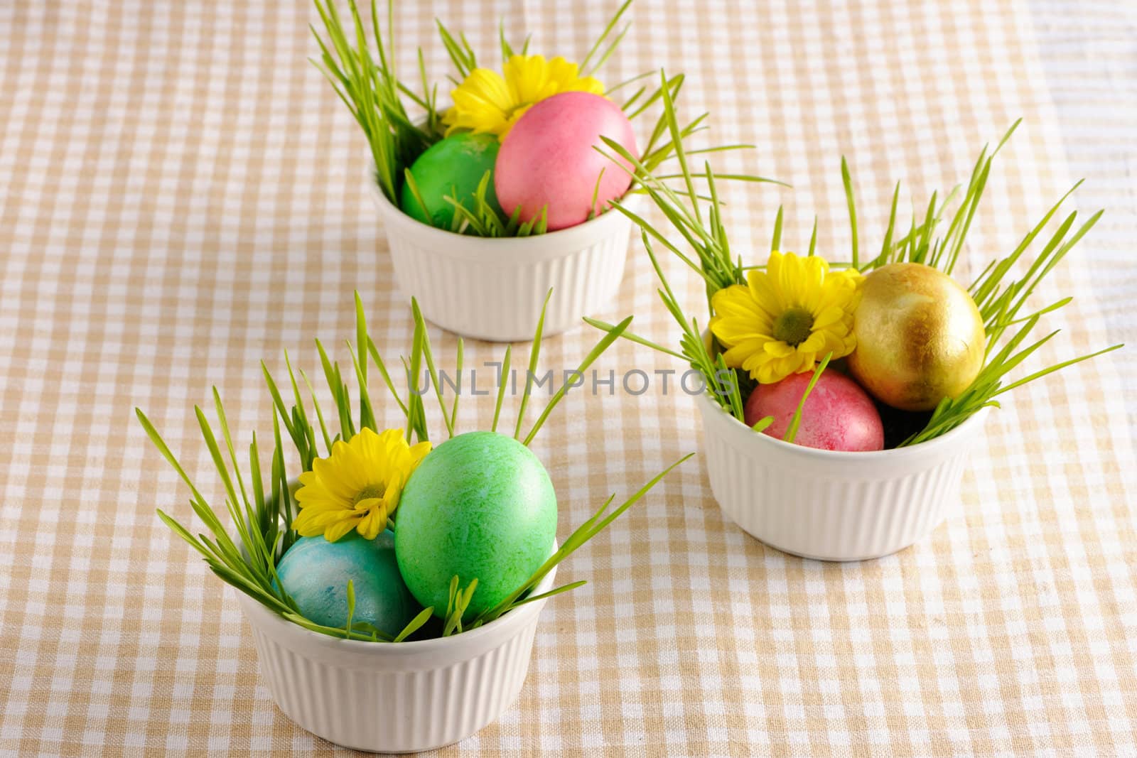 Colored easter eggs on tablecloth