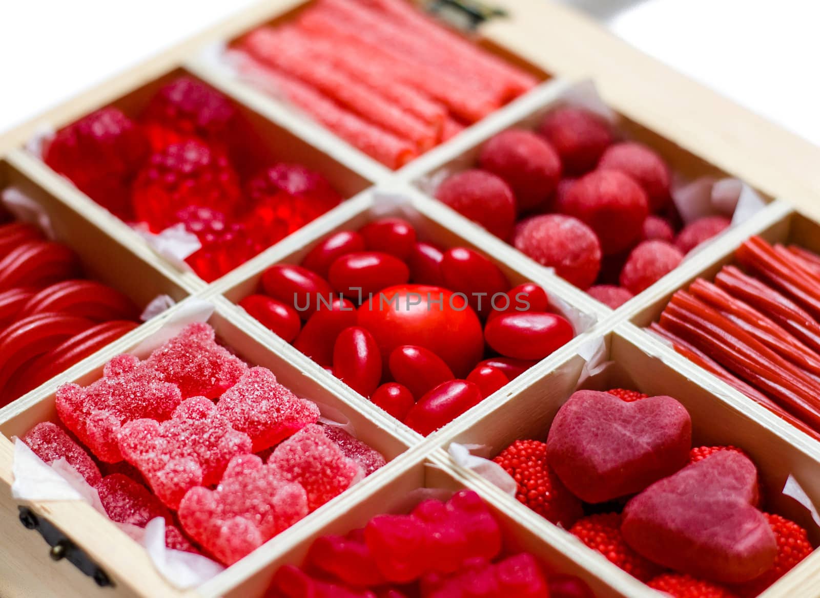 Nine candy varieties inside a wooden box