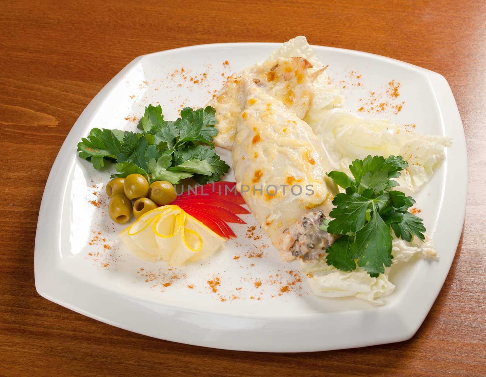 Squid Stuffed with Fish and Vegetables.Italian cuisine