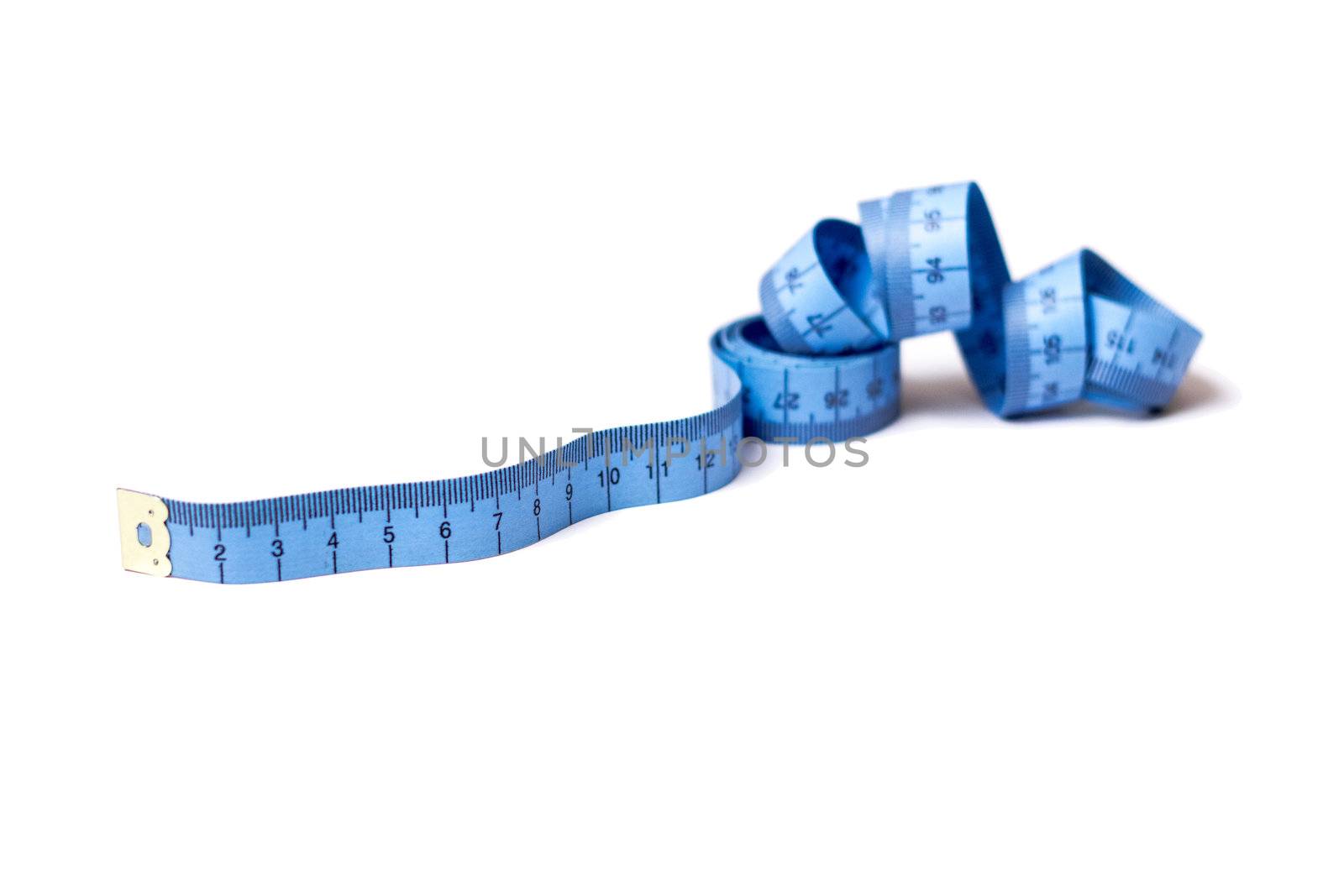Blue measuring tape of the tailor isolated on white background