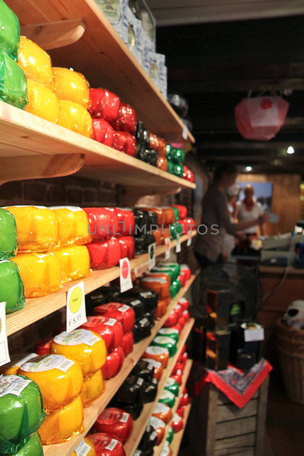 Shelves with different types of typical Dutch cheese.