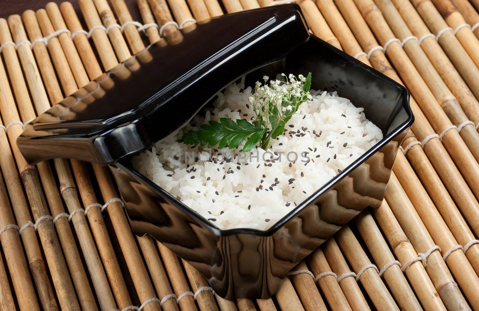 Bowl of cooked rice closeup