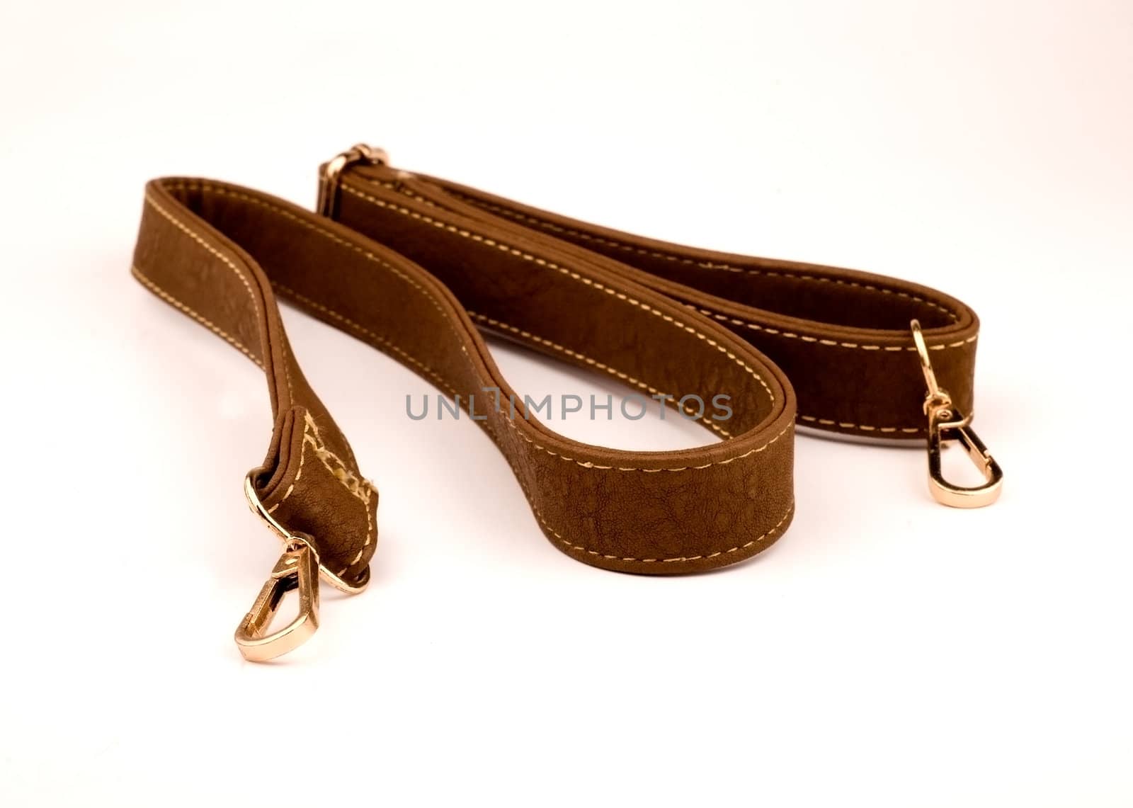 Leather Strap bag brown color on a white background