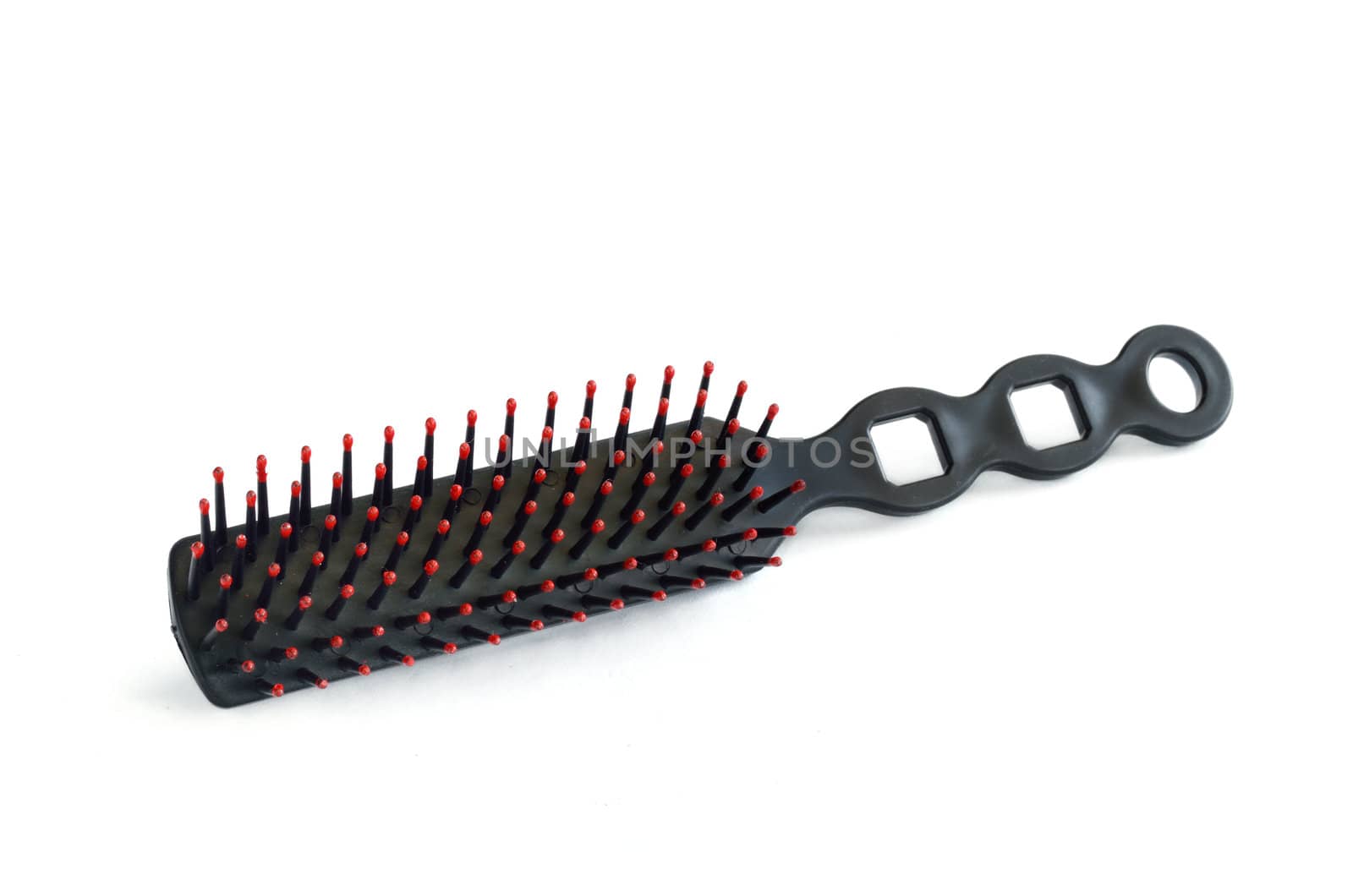 Brush hair styling isolated on white