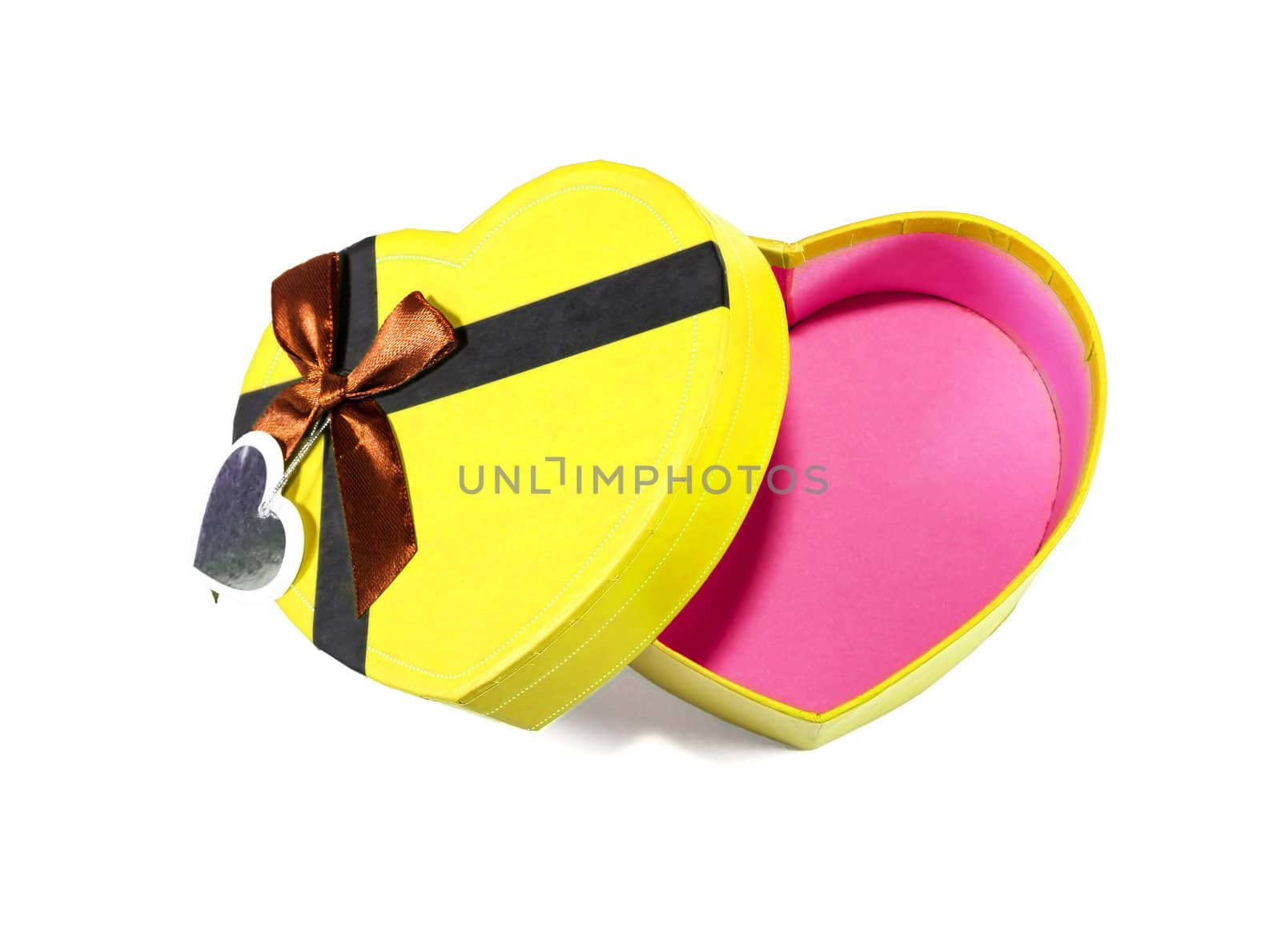 Yellow Heart-shaped box in heart shape on white background