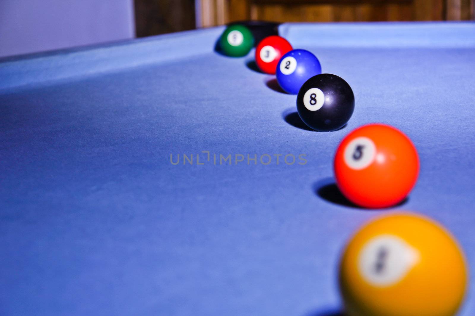 Line color billiard balls on blue pool table mat by doble.d