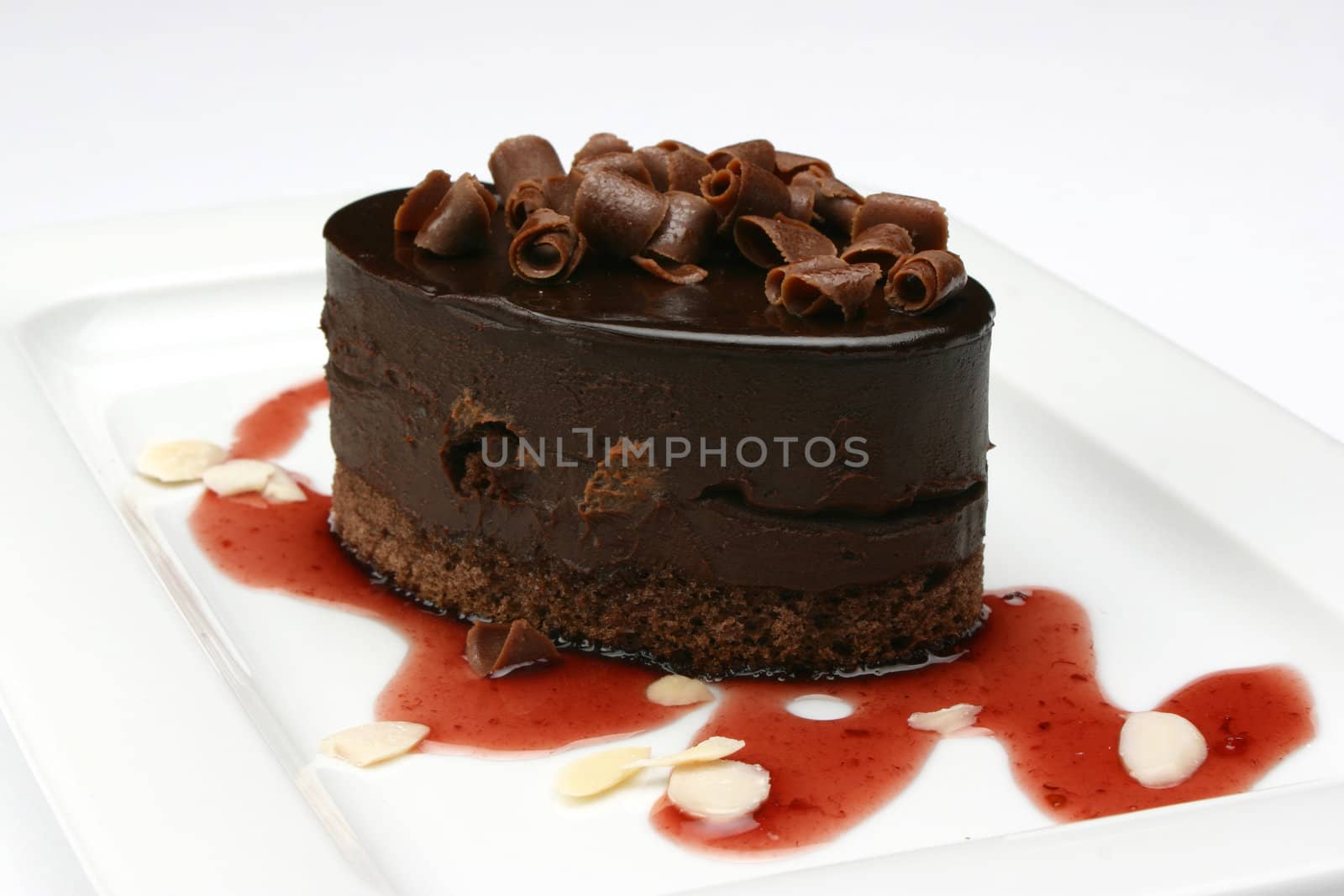 chocolate sweet cake with strawberry syrup