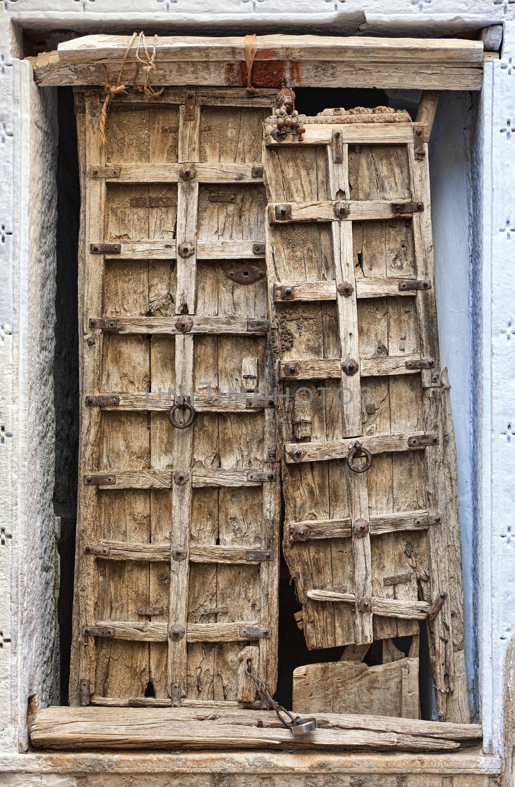 Old dilapidated wooden door. by vladimir_sklyarov