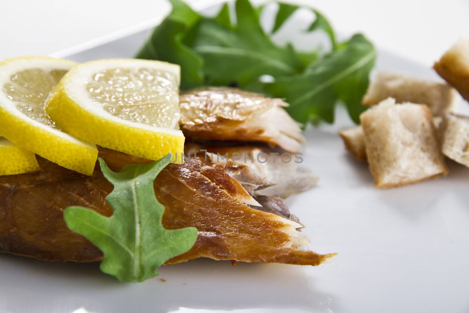 Smoked mackerel fish with lemon salad and bread