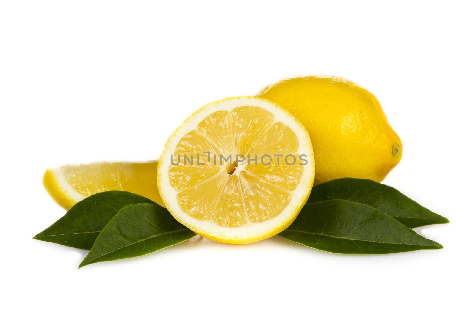 Fresh lemon fruits with leaves over white background