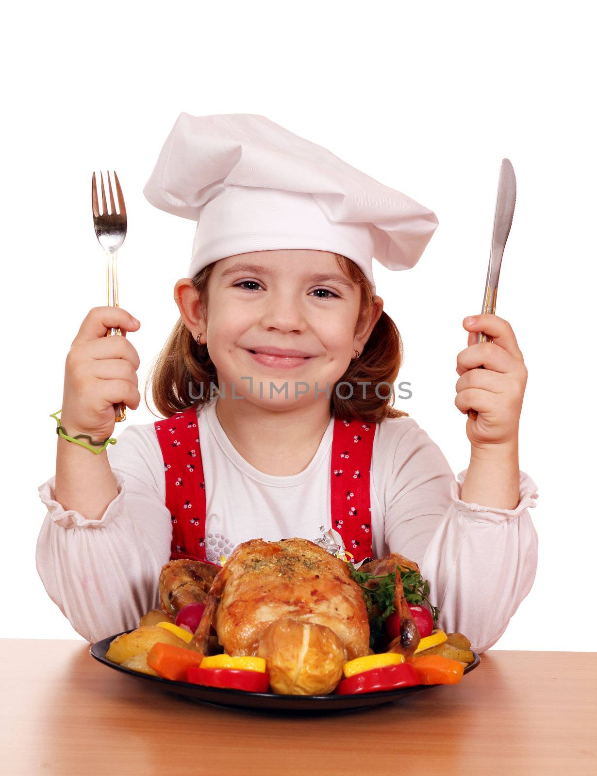 little girl cook with grilled chicken