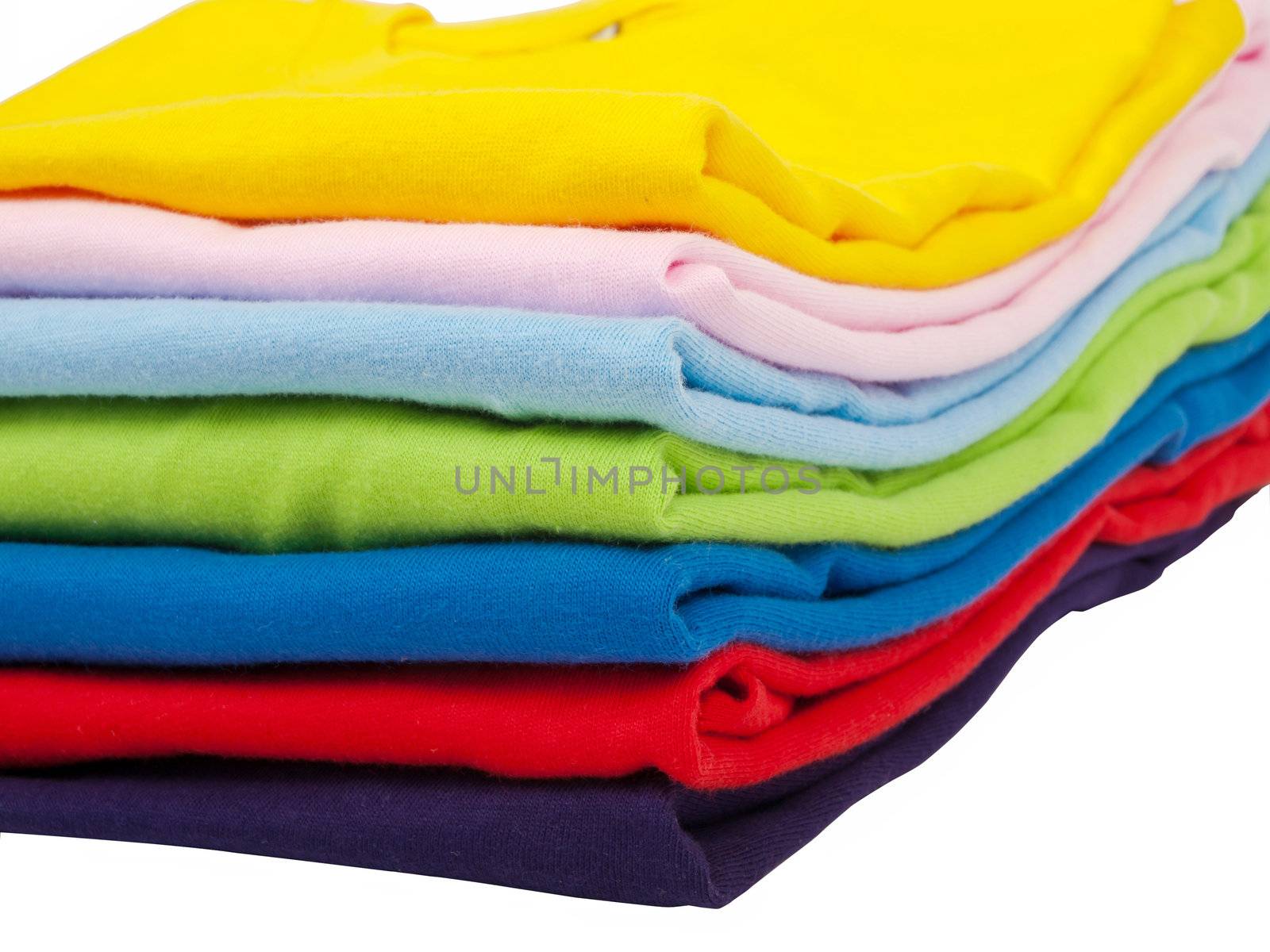 a stack of colorful t shirts - front view