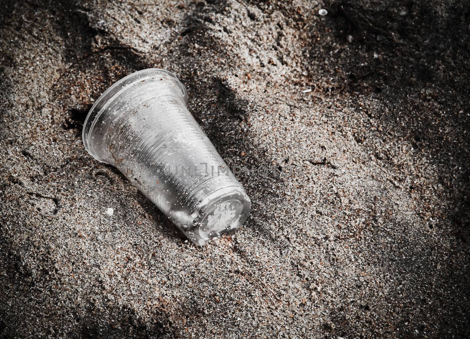 garbage plastic glass on the beach