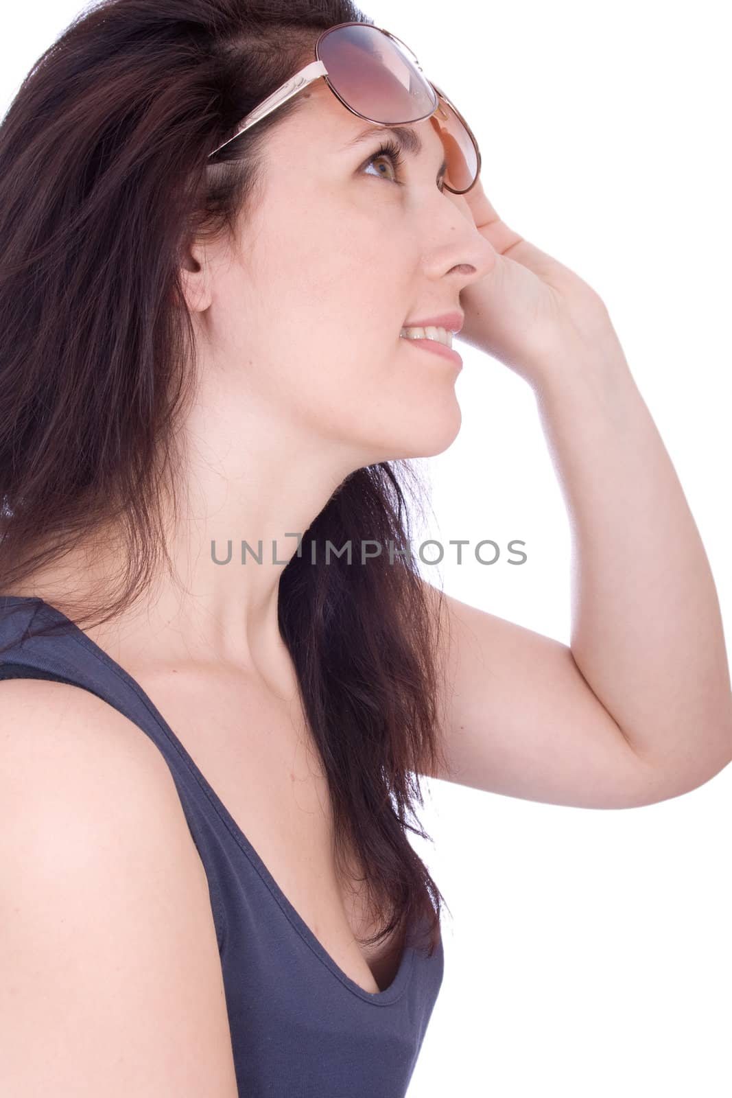 Portrait of lovely woman in shades over white

