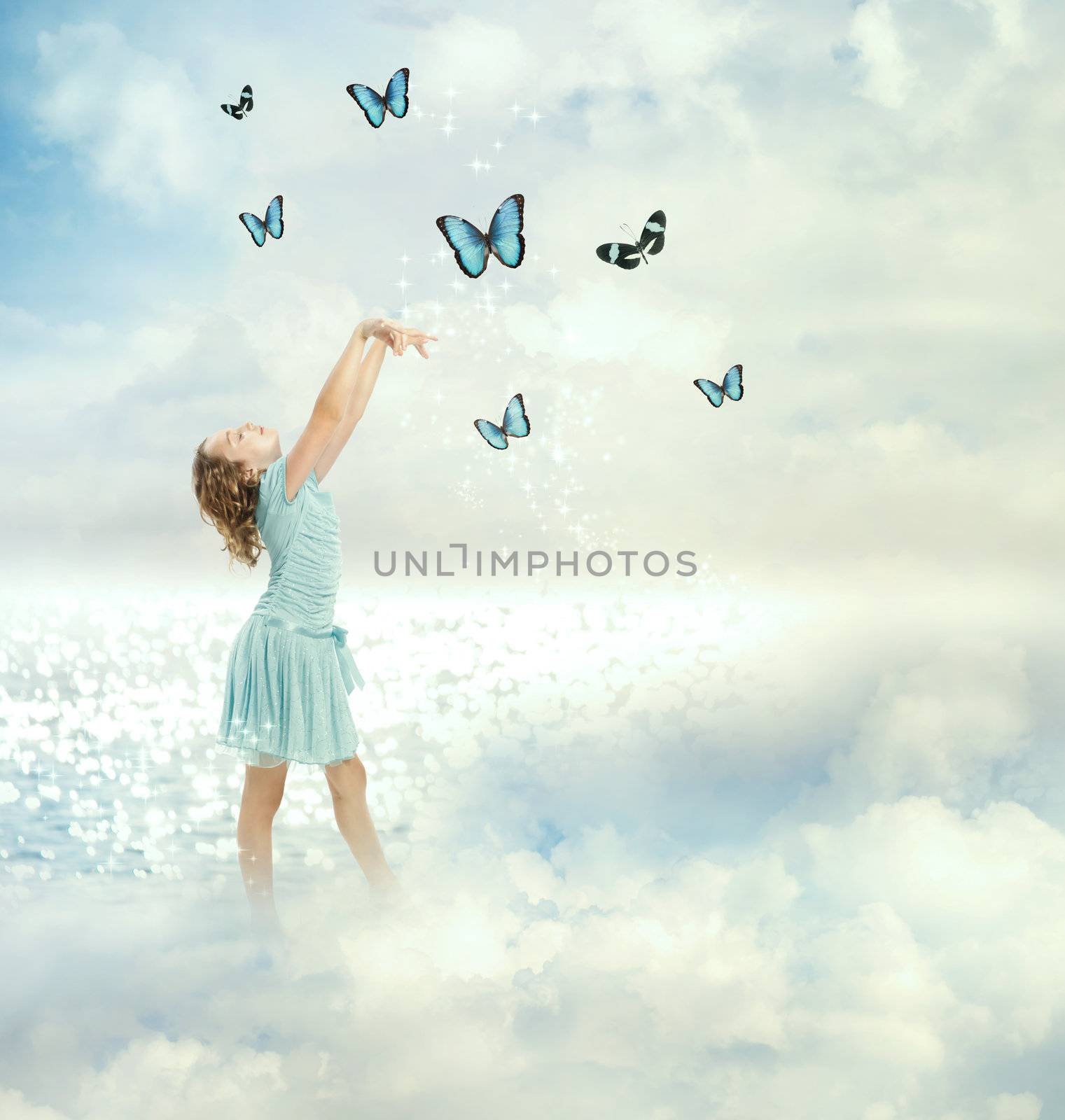 Little girl in a blue dress with blue butterflies (Fantasy)