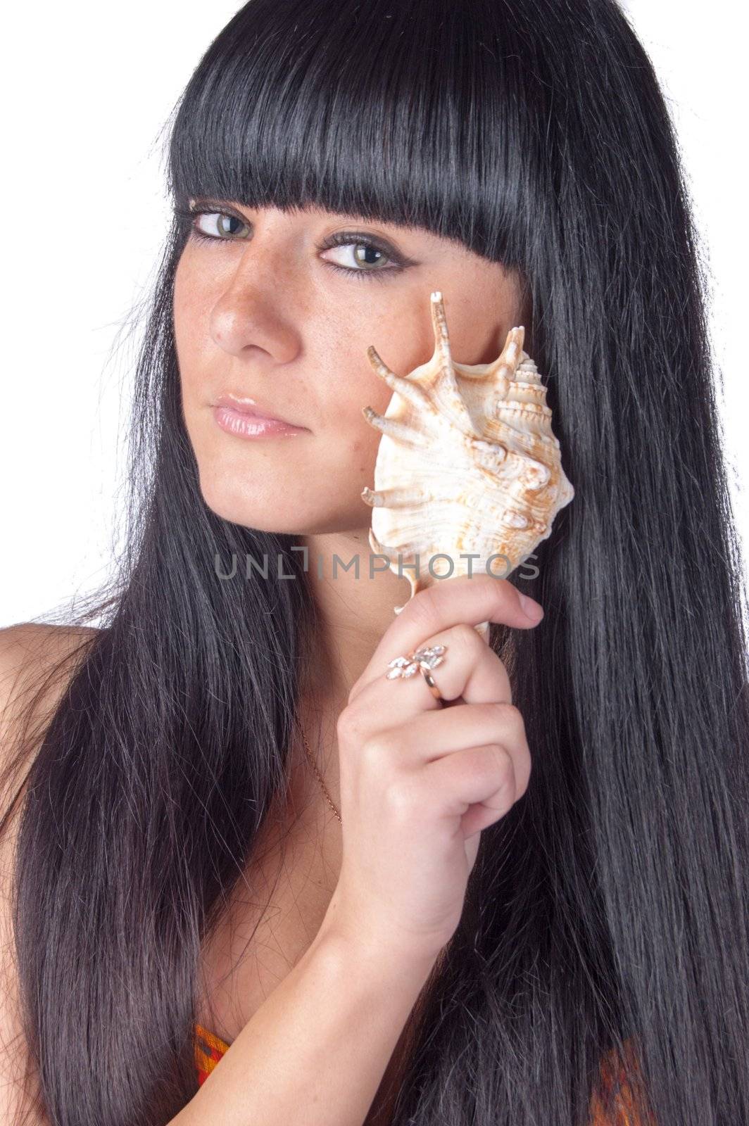 young woman posing with marine shell by mettus