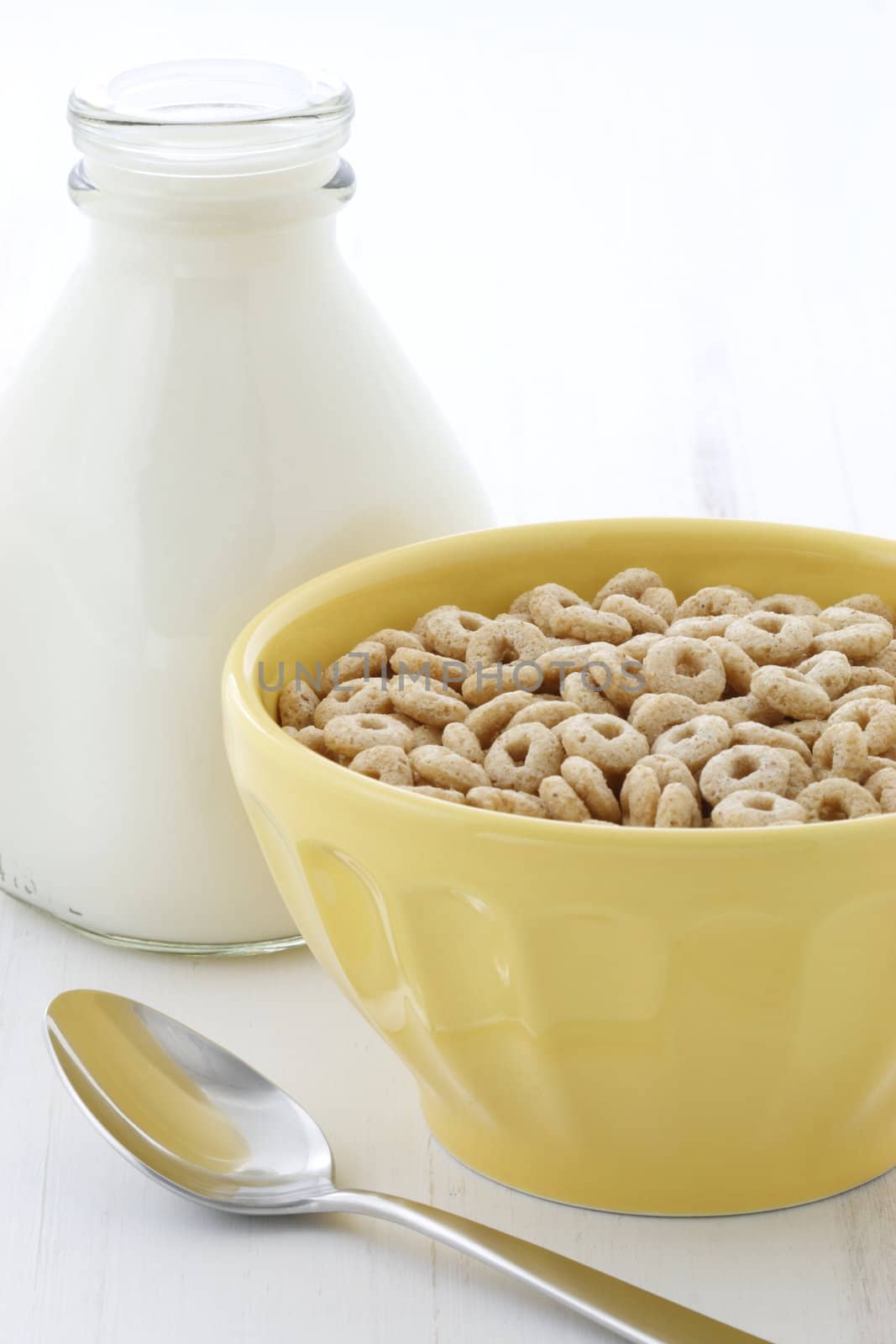 Delicious and nutritious lightly toasted honey, nuts and oats cereal with milk.