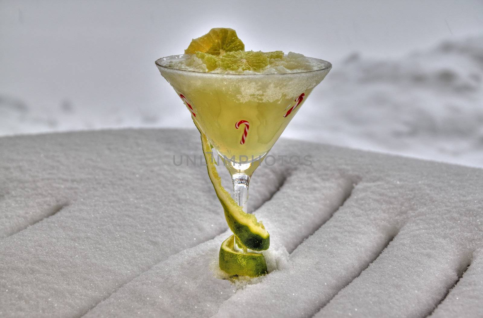 Decorated frozen marguerita drink on a bed of snow