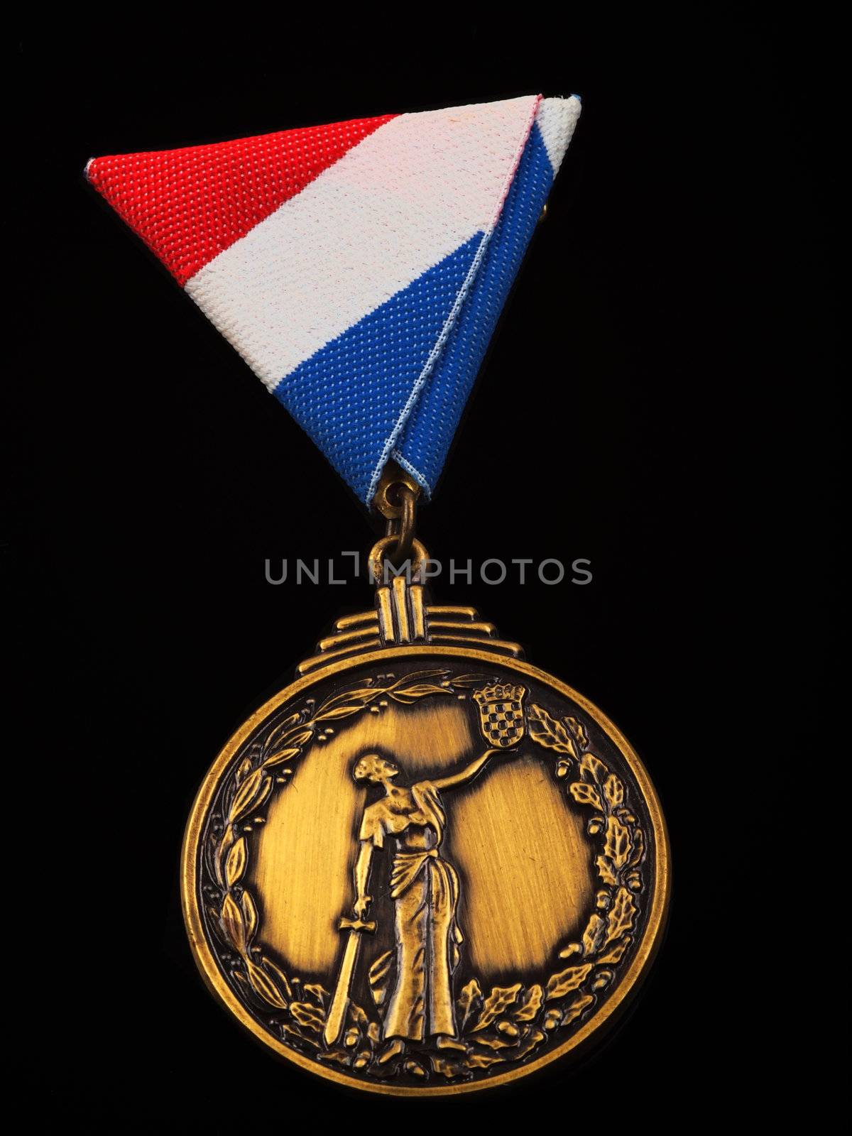 bronze medal for war heroes,isolated on black background        
