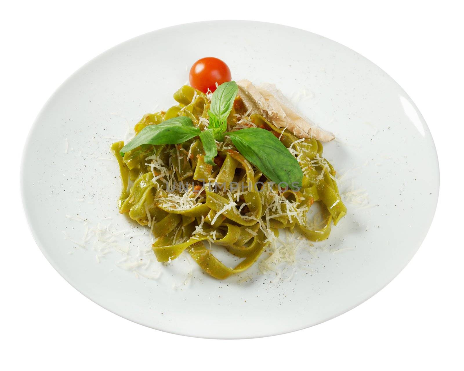Pasta tagliatelle with pesto sauce basil and grated parmesan