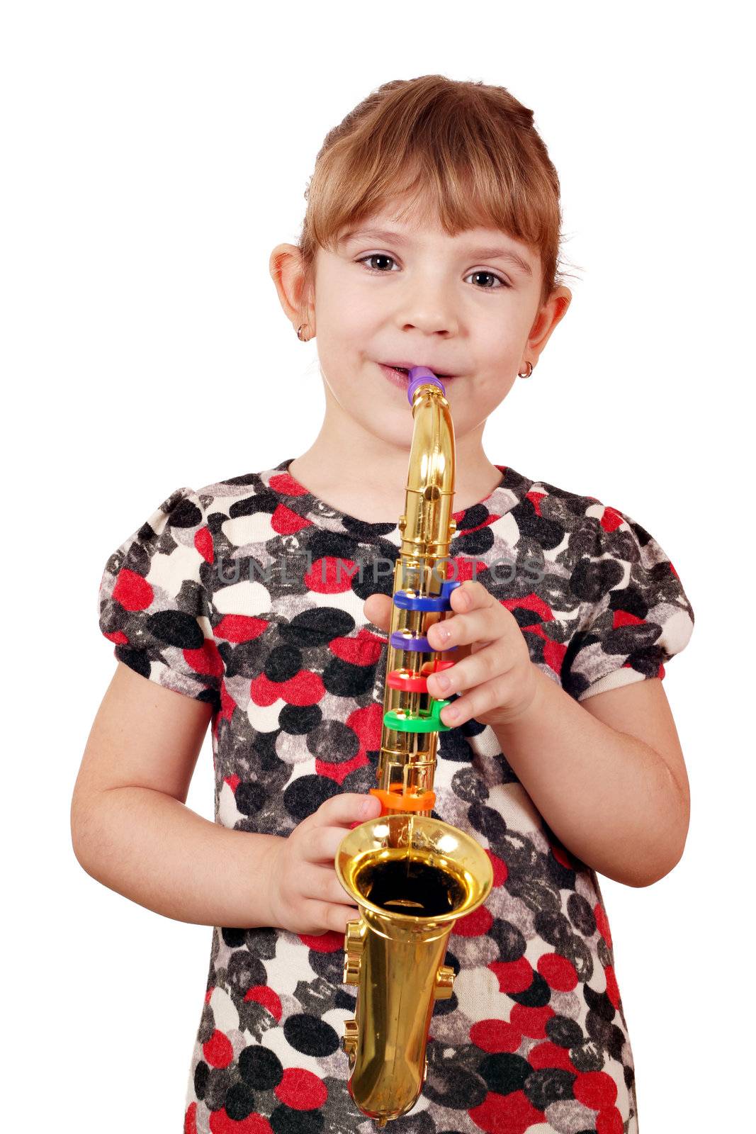 happy little girl play saxophone