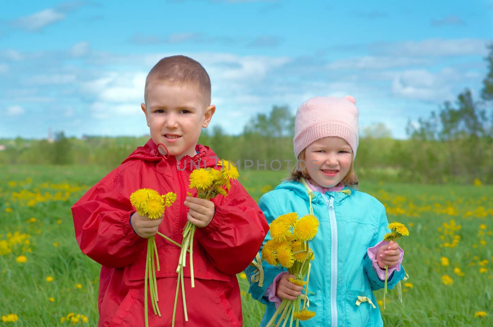 boy and small girl  on meadow  by Fanfo