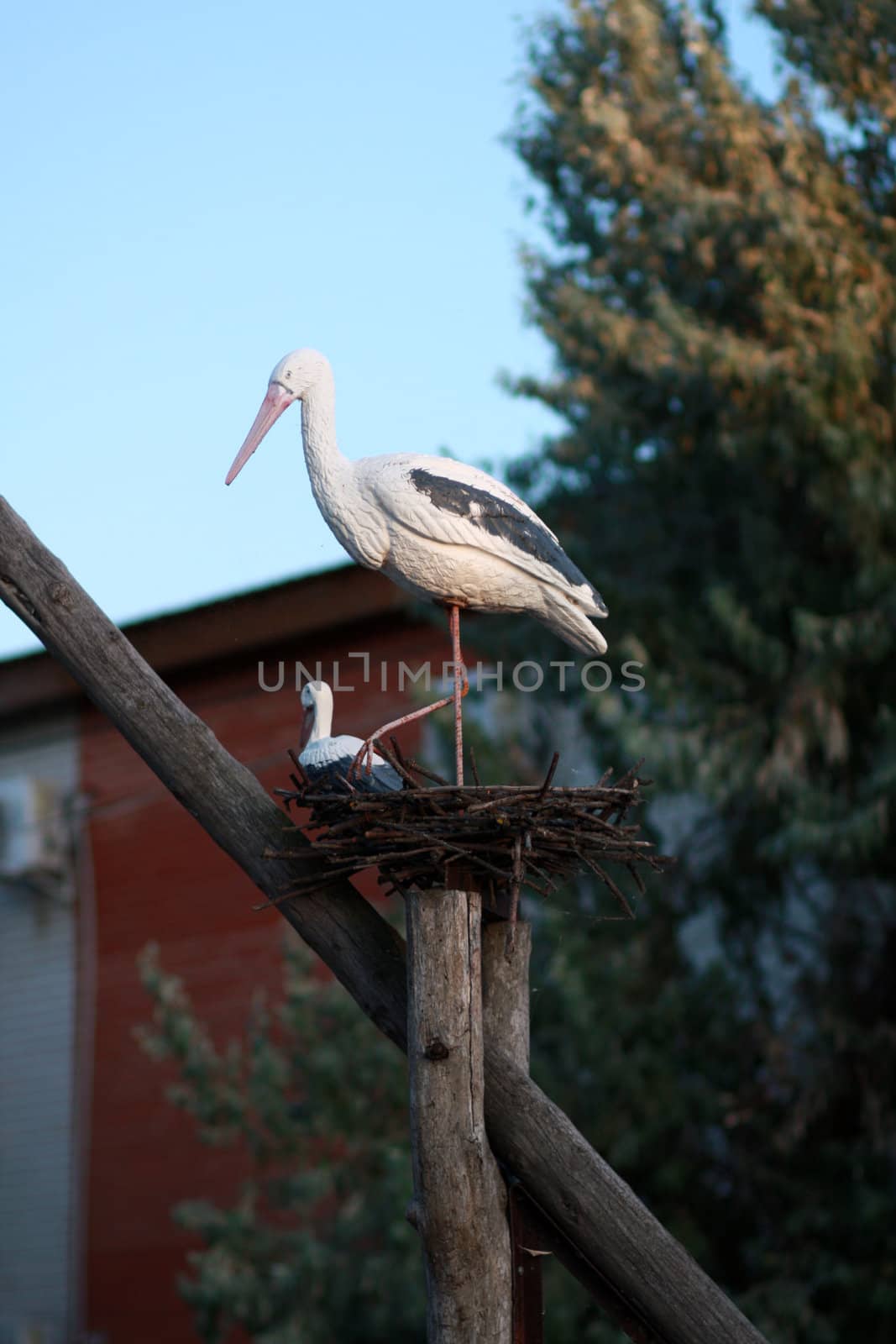 Decorative nest with two storks