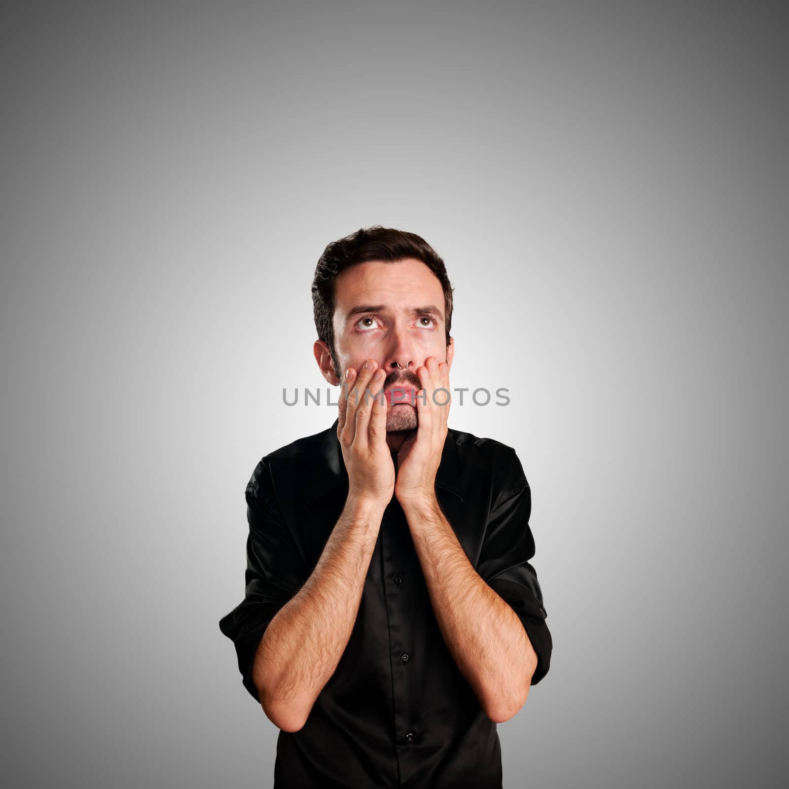 desperate man on gray background