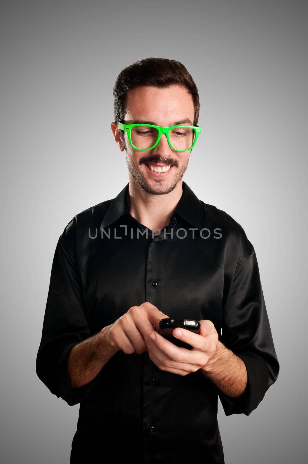 happy man holding phone by peus