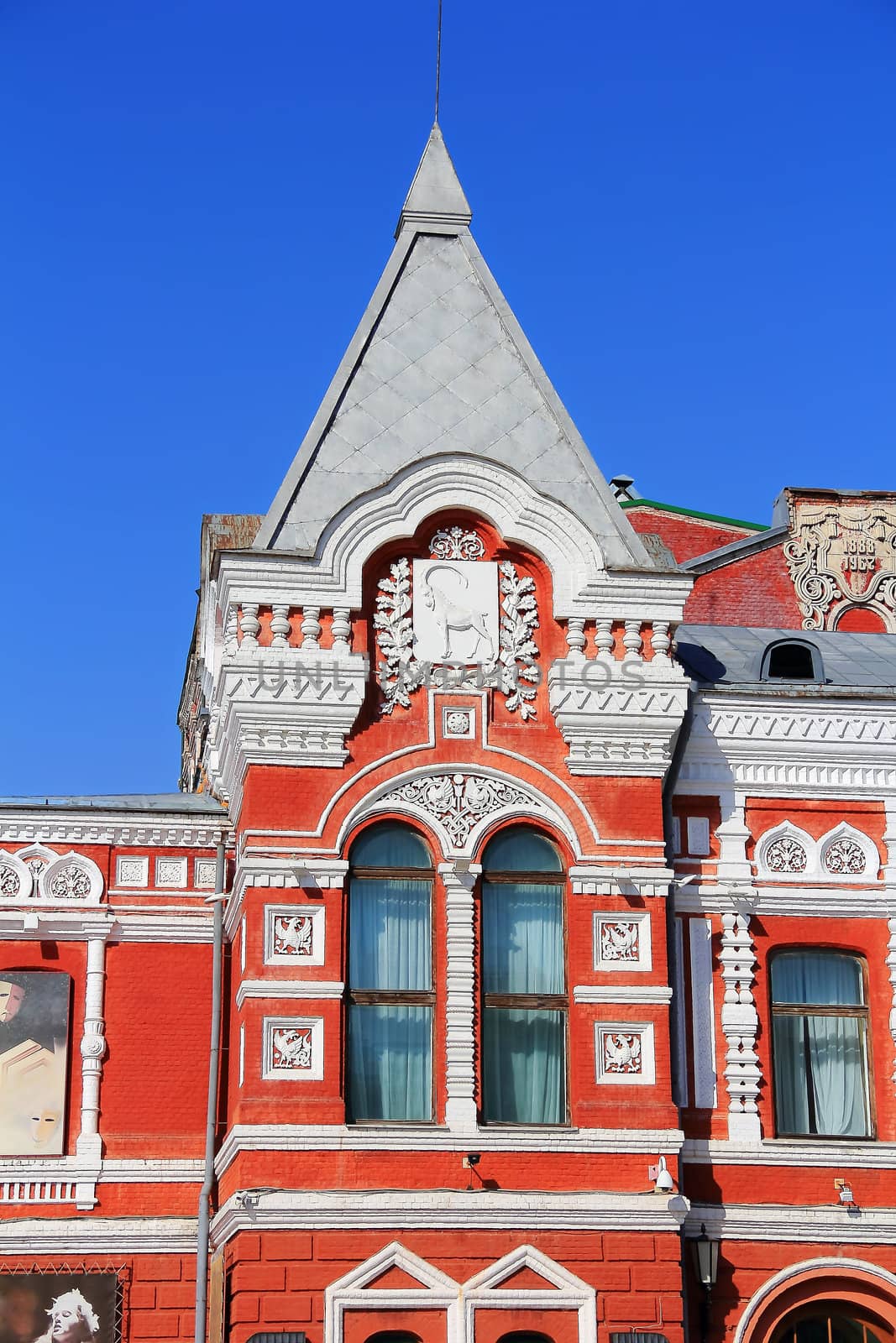 Town landscape with historic theater and blue sky