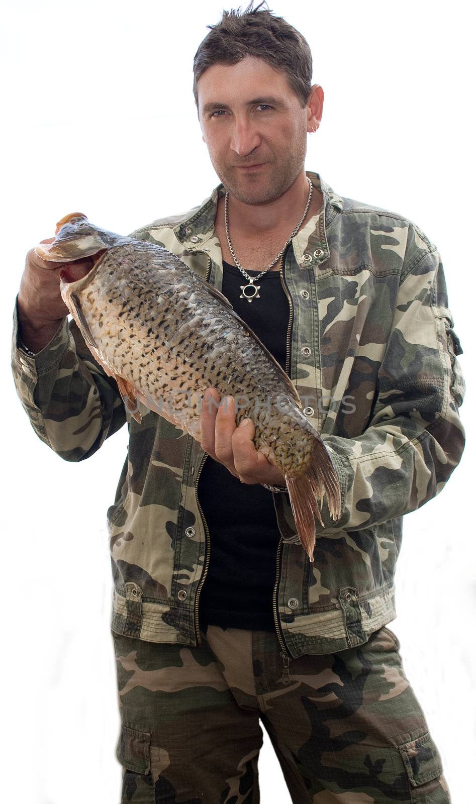 Male angler with the fish on a white background