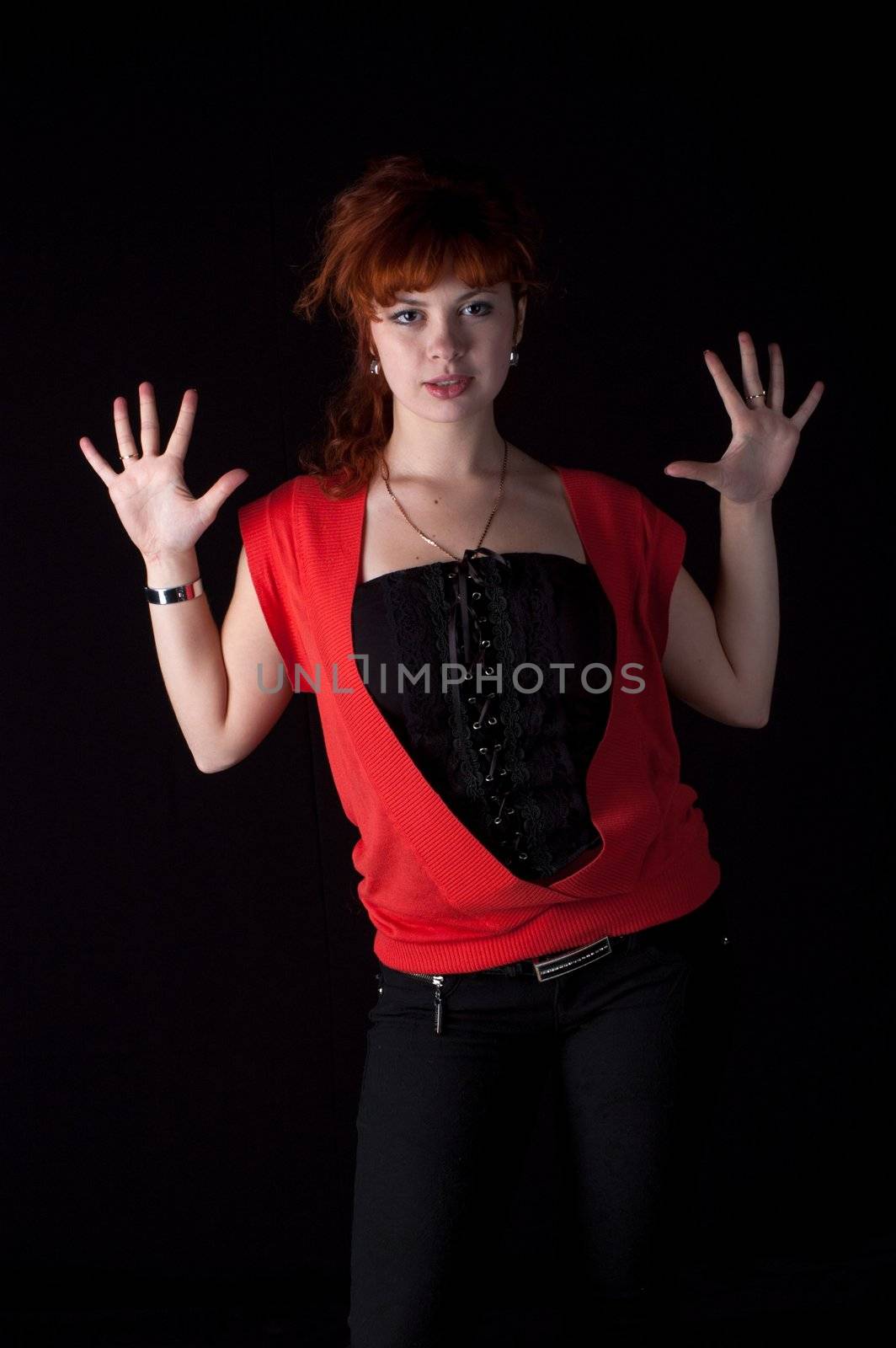 beautiful redhead girl torso shot on black