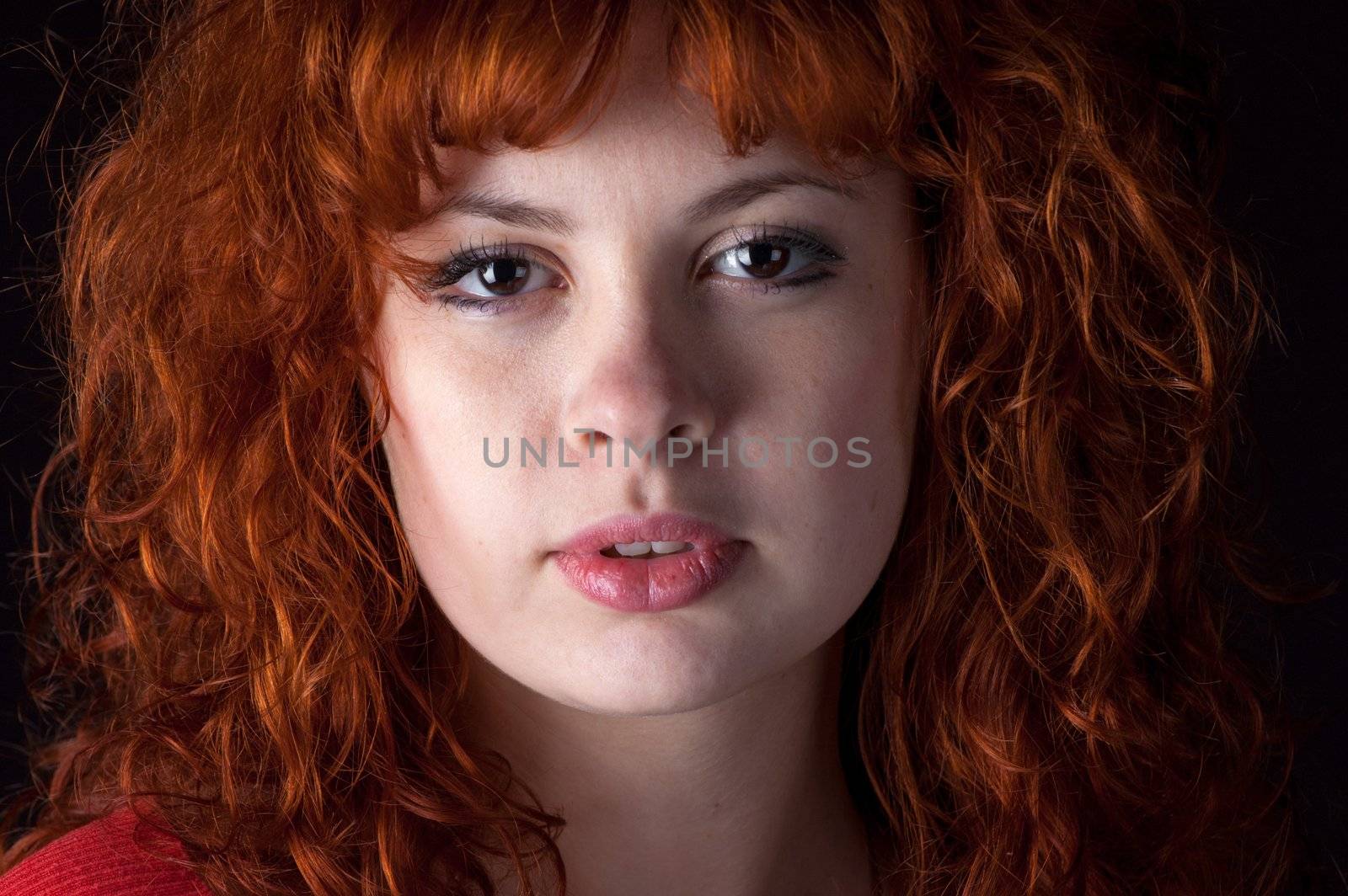 Beautiful sexy woman with red hair
