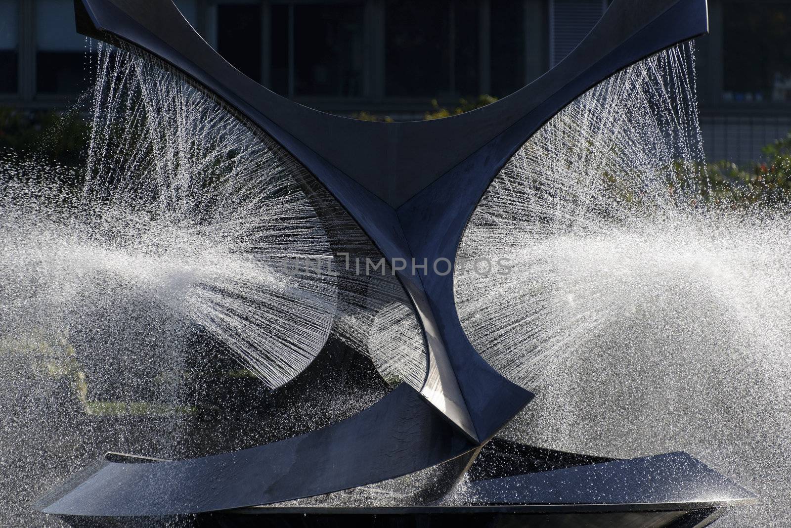 Modern fountain in a park in summer