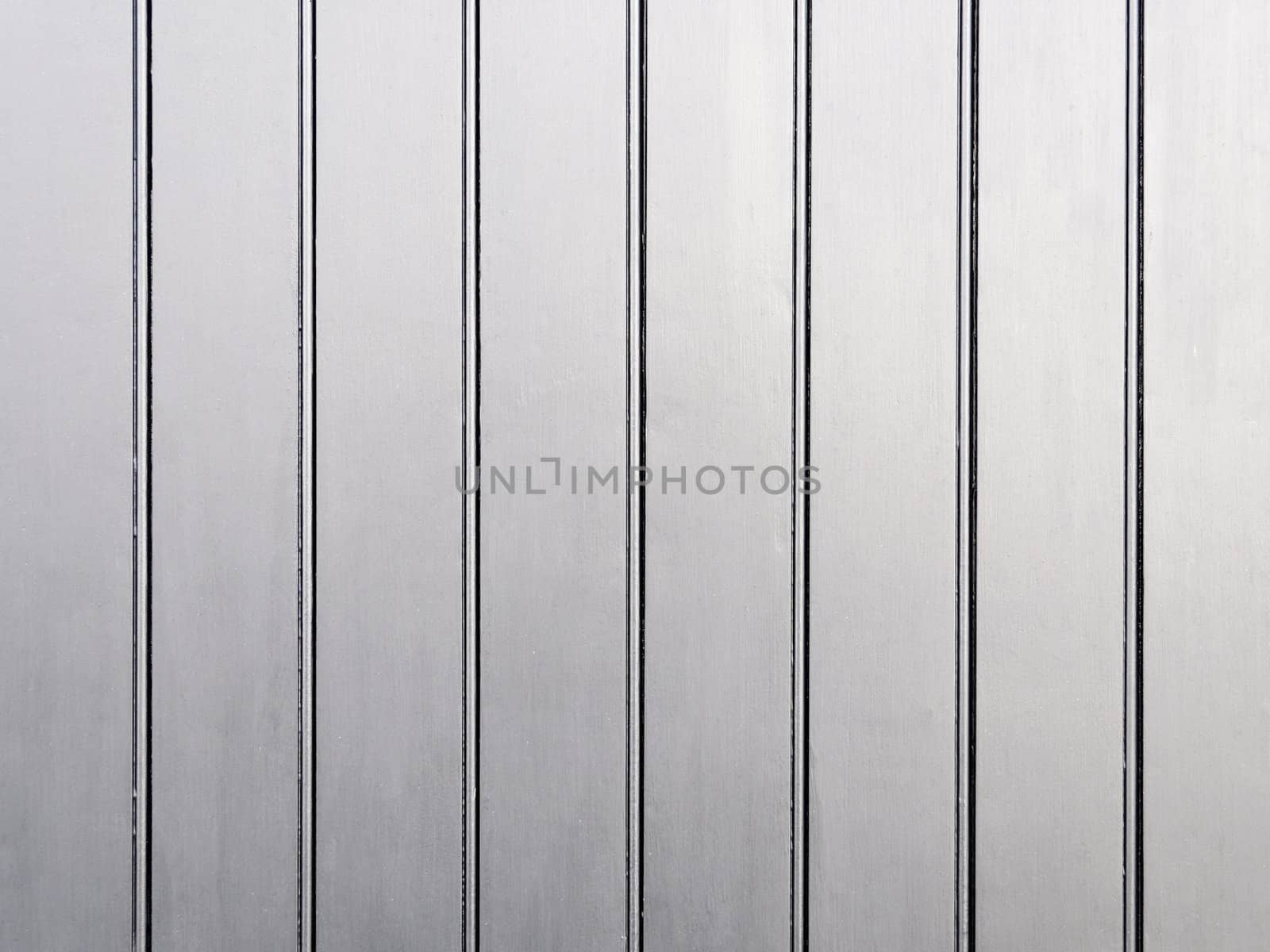 A silver painted wooden wall