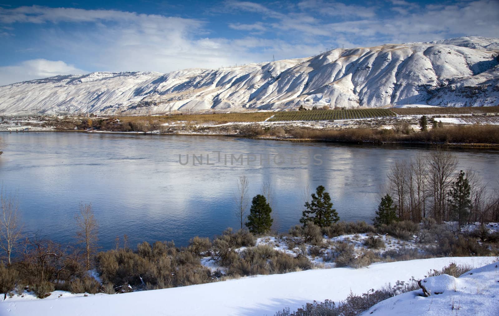 Columbia River Flows After Fresh Snow by ChrisBoswell