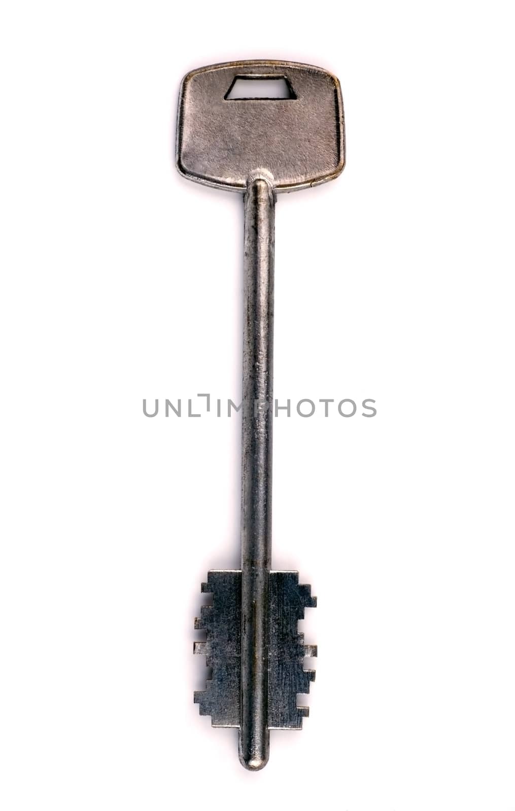 General view of the white metal key close-up on white background