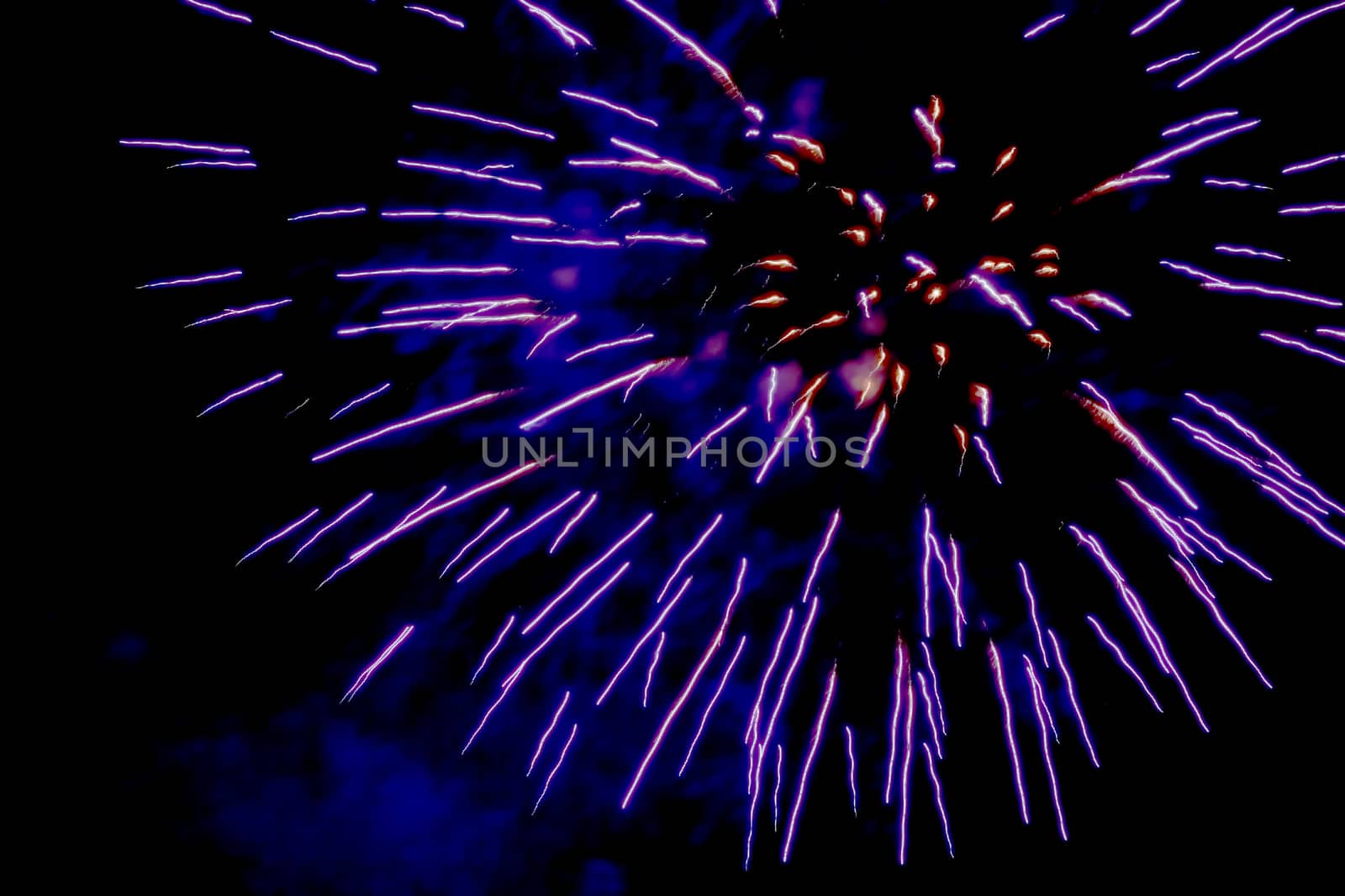 Start the New Year's fireworks in the night sky in the city of Krivoy Rog in Ukraine